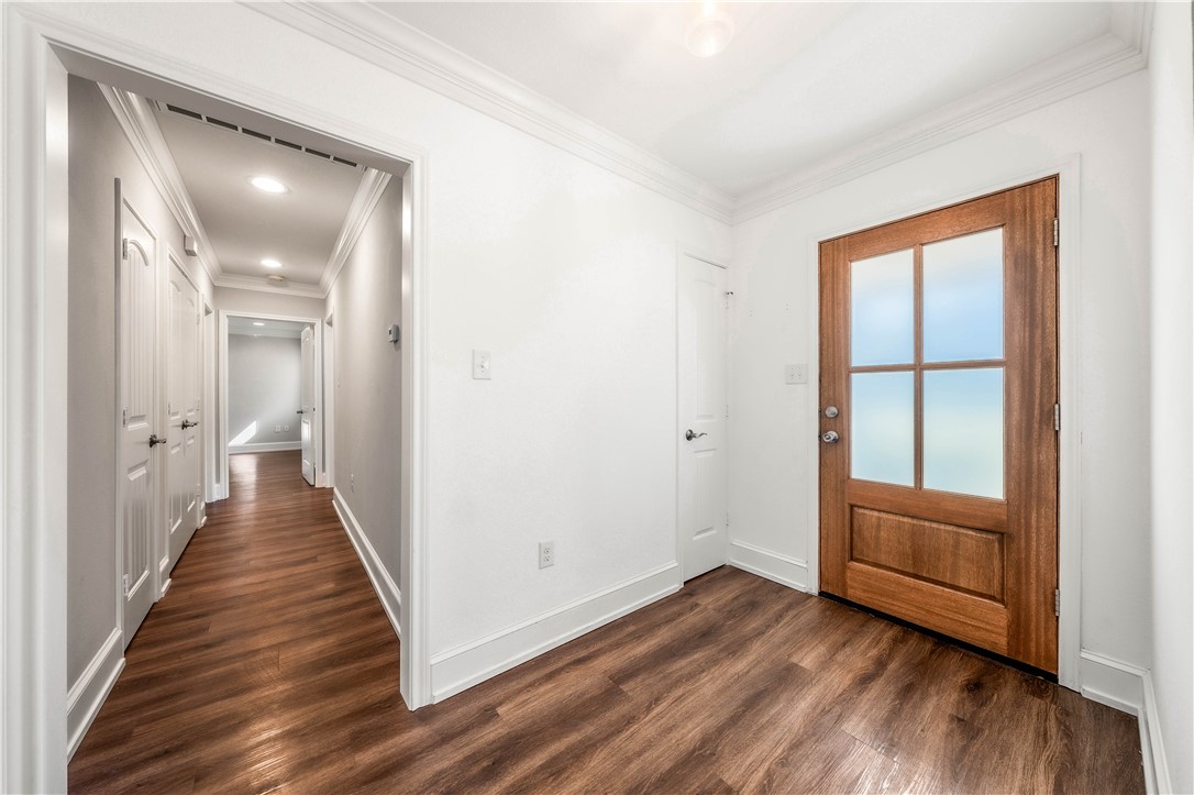 3405 MacArthur Drive Waco, TX 76708 - Photo 52 of 83 a view of a hallway with wooden floor and closet