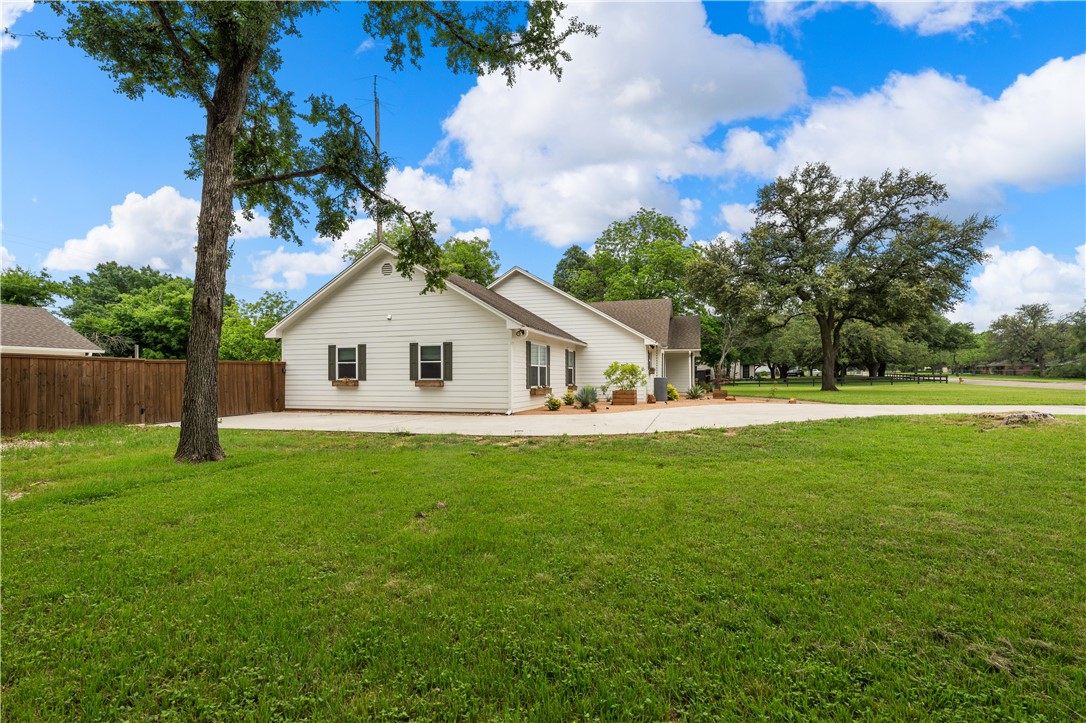3405 MacArthur Drive Waco, TX 76708 - Photo 71 of 83 a view of a house and a yard and trees