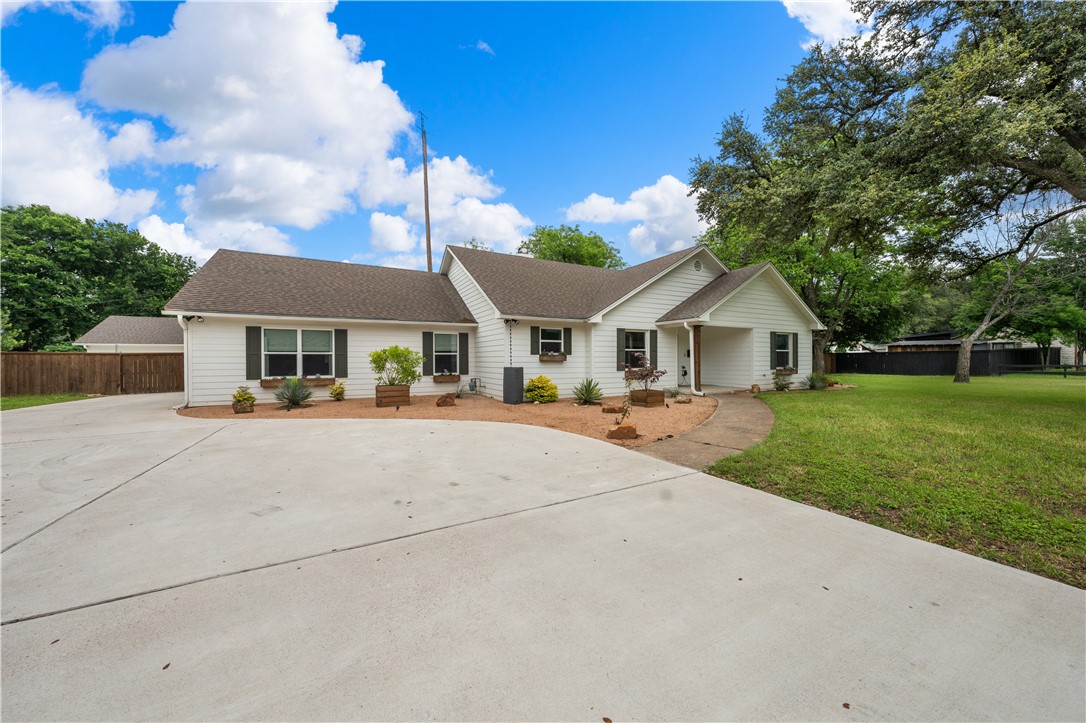 3405 MacArthur Drive Waco, TX 76708 - Photo 73 of 83 a front view of a house with a yard