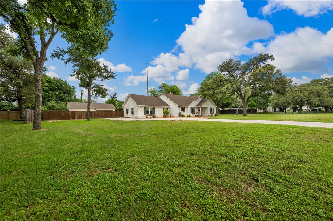 3405 MacArthur Drive Waco, TX 76708 - Photo 77 of 83 a view of yard with swimming pool and green space