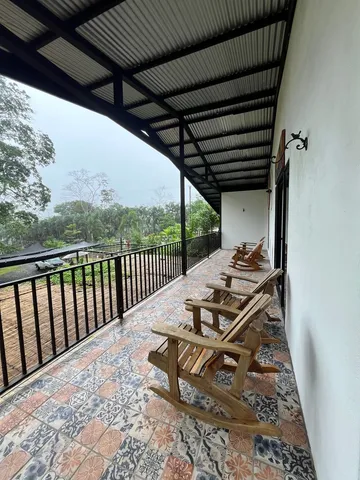 a view of a patio with wooden floor