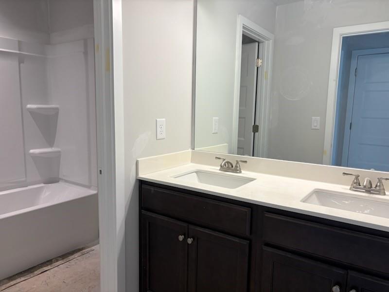6 Commons Way Cartersville, GA 30120 - Photo 17 of 37 a bathroom with a sink and a mirror