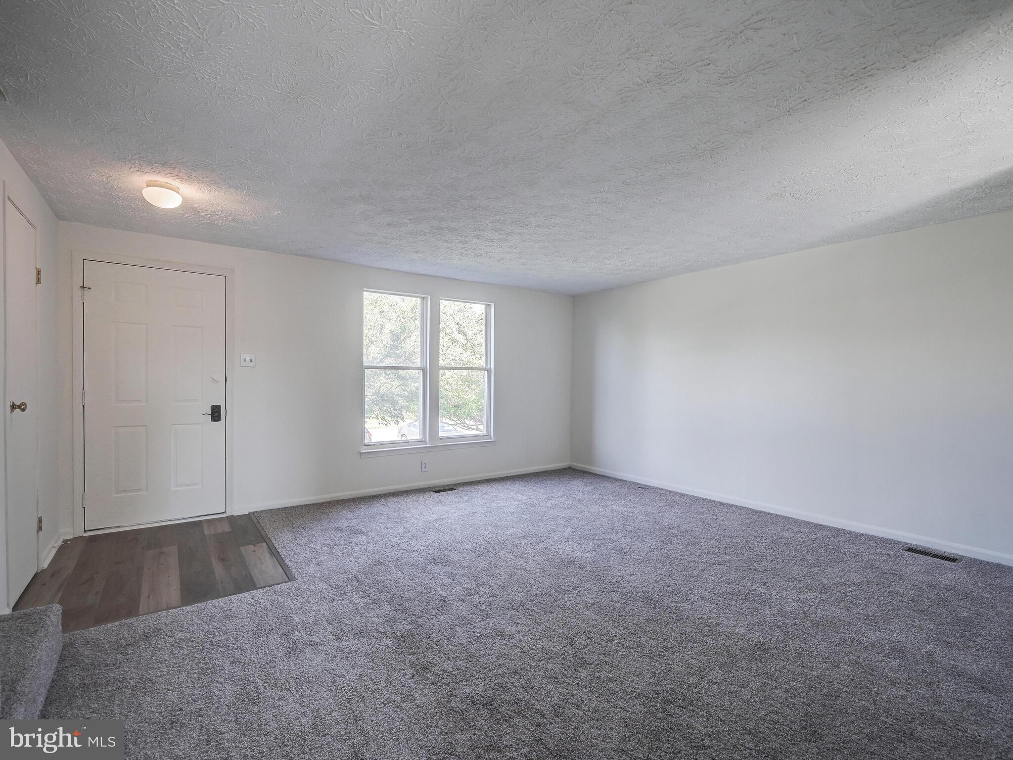35 Greenleaf Road Baltimore, MD 21234 - Photo 5 of 30 Family Room with new carpet installed in 2021