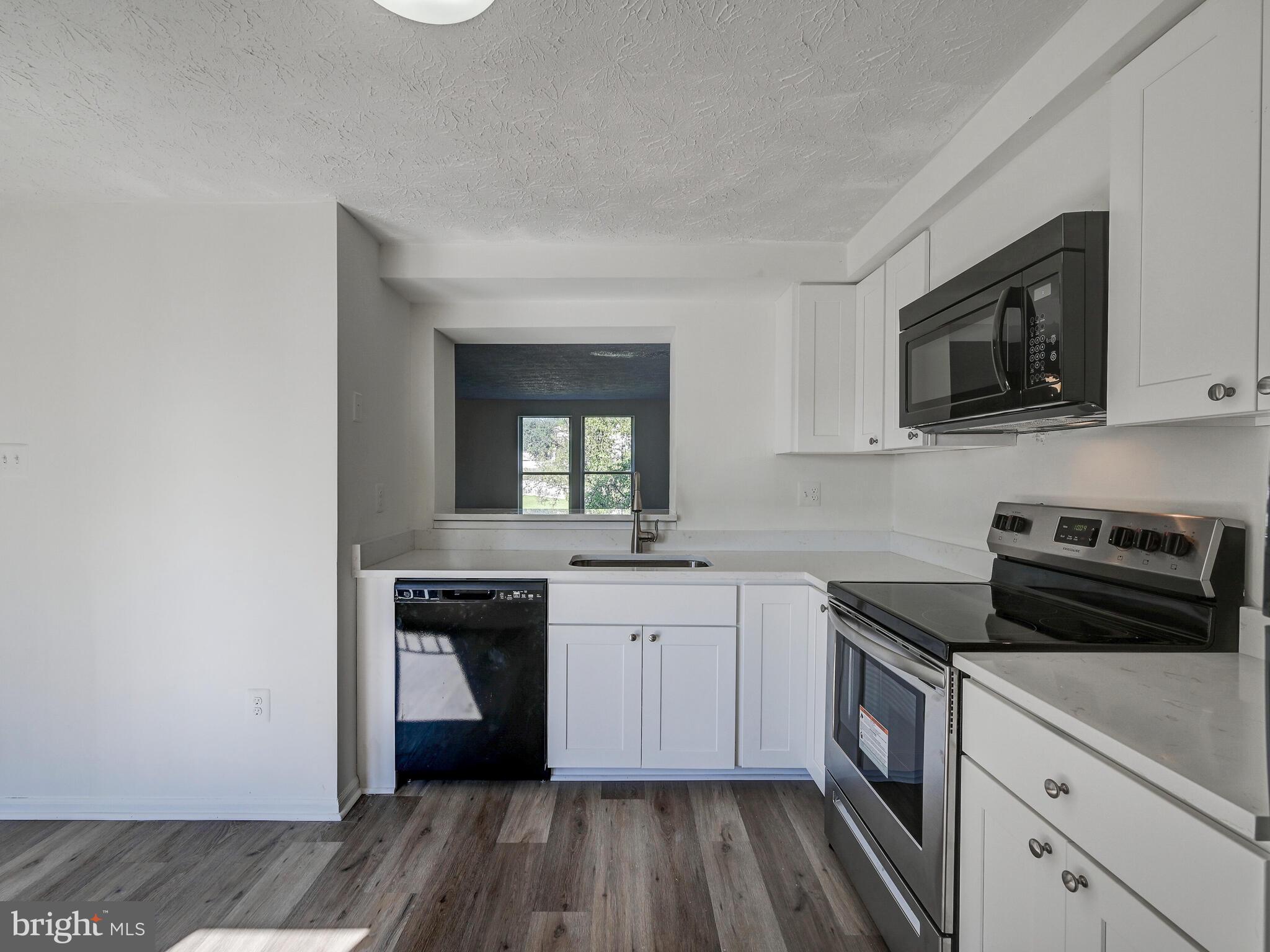 35 Greenleaf Road Baltimore, MD 21234 - Photo 7 of 30 Renovated Kitchen with Quartz Countertops (2021)