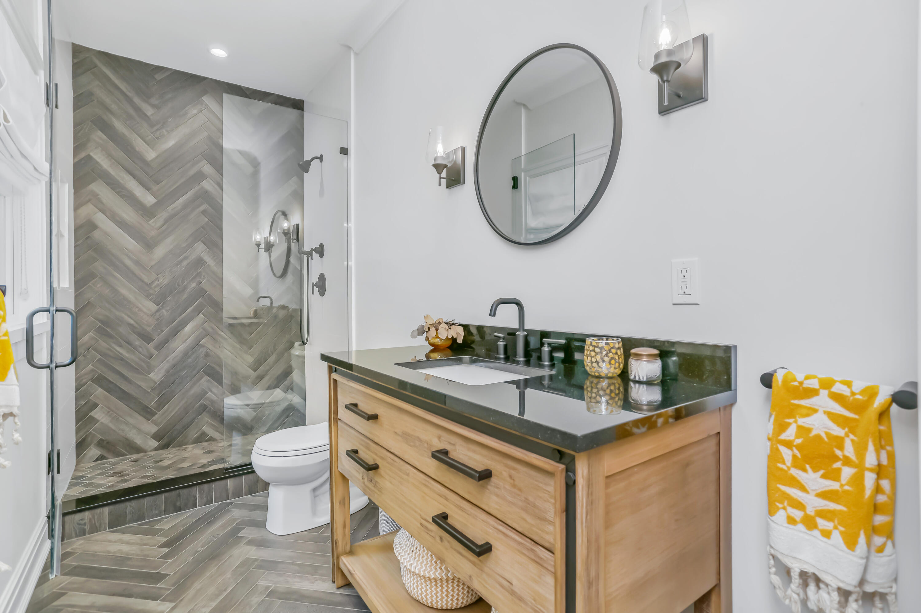 46 Blueberry Hill Road Redding, CT 06896 - Photo 15 of 32 a bathroom with a granite countertop toilet sink and mirror