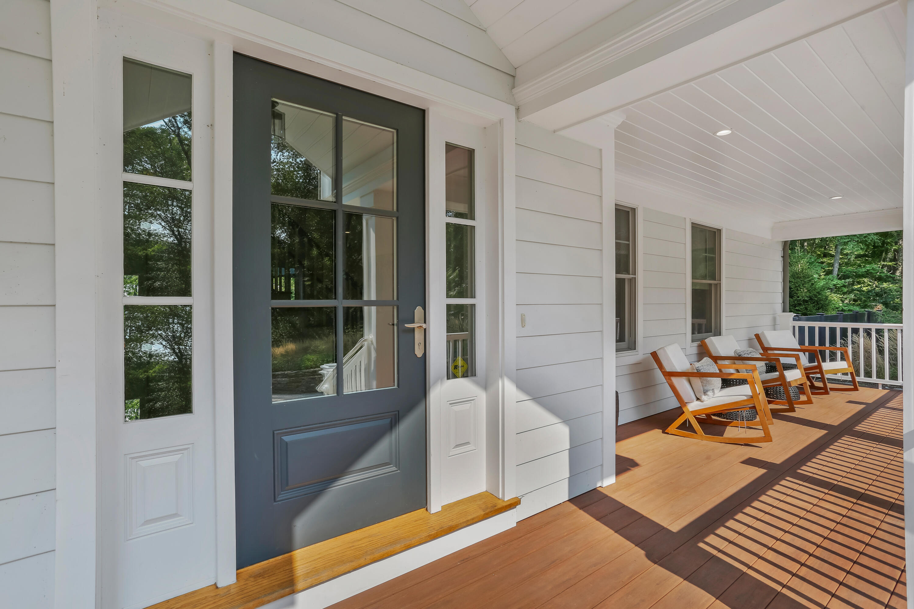 46 Blueberry Hill Road Redding, CT 06896 - Photo 2 of 32 a balcony with furniture and front door