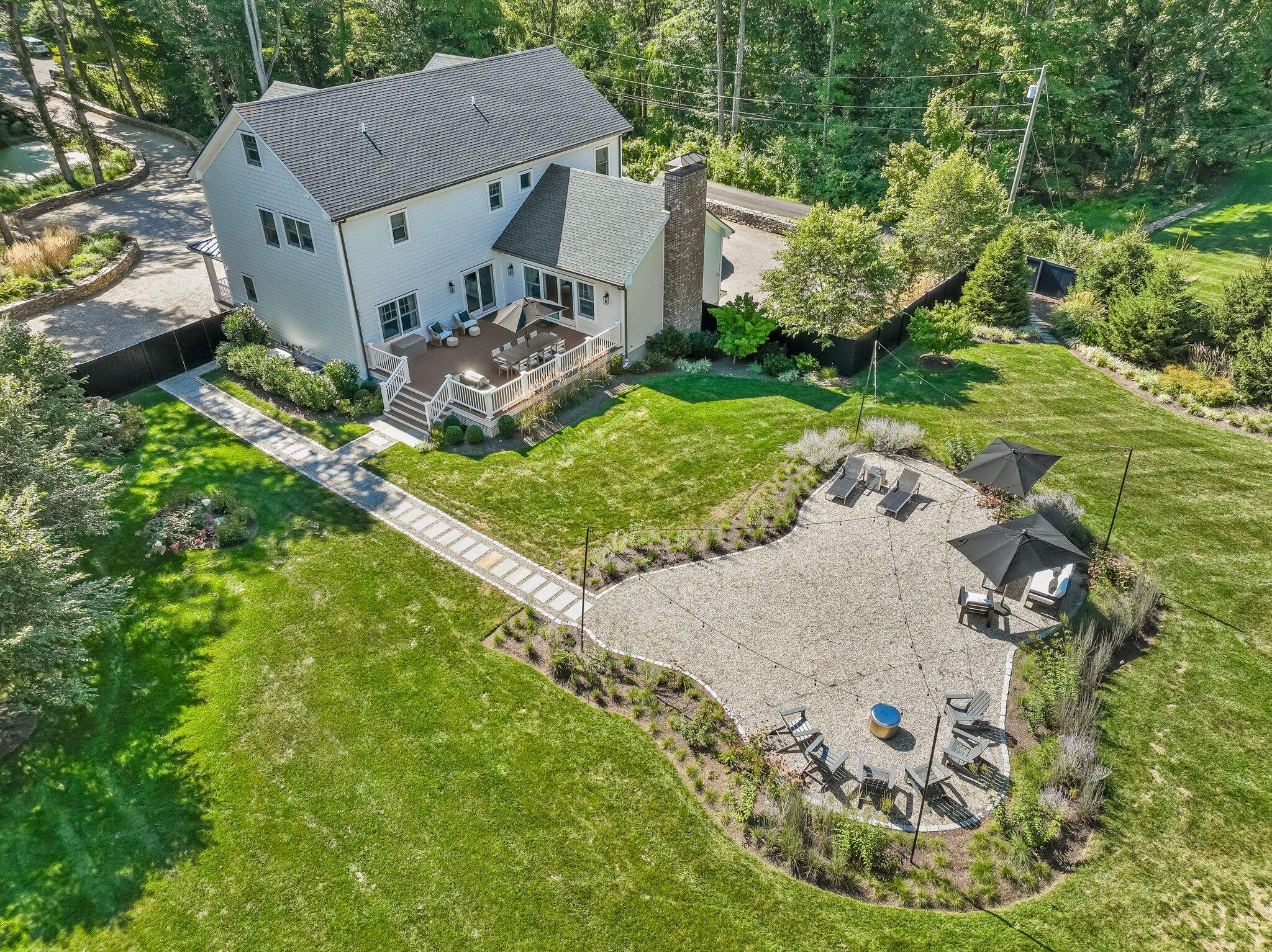 46 Blueberry Hill Road Redding, CT 06896 - Photo 25 of 32 a aerial view of a house with garden