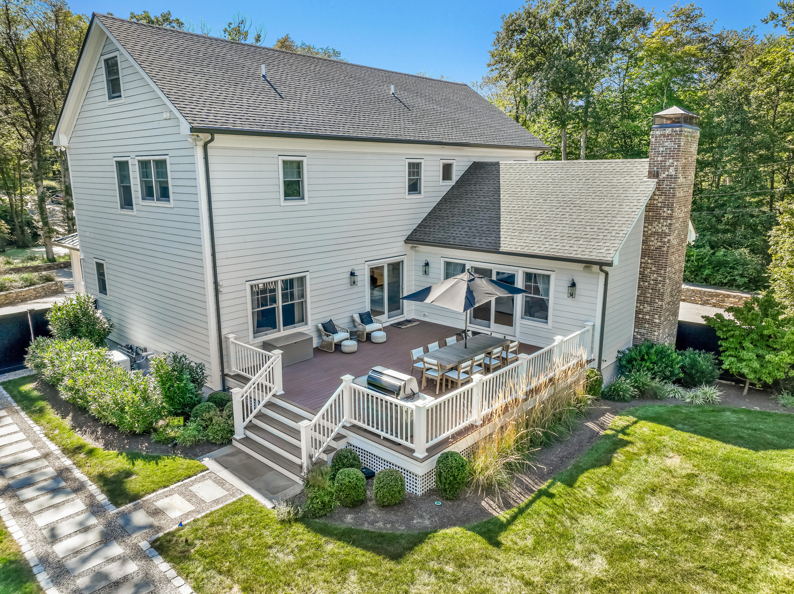 46 Blueberry Hill Road Redding, CT 06896 - Photo 26 of 32 front view of a house with a yard