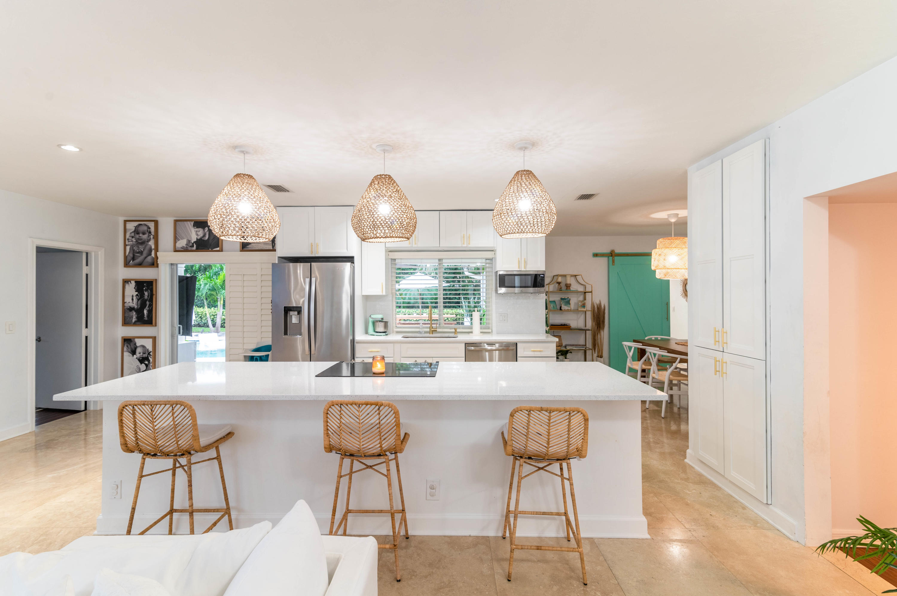 1502 Northwest 5th Street Boca Raton, FL 33486 - Photo 14 of 35 a view of a dining room with furniture and wooden floor