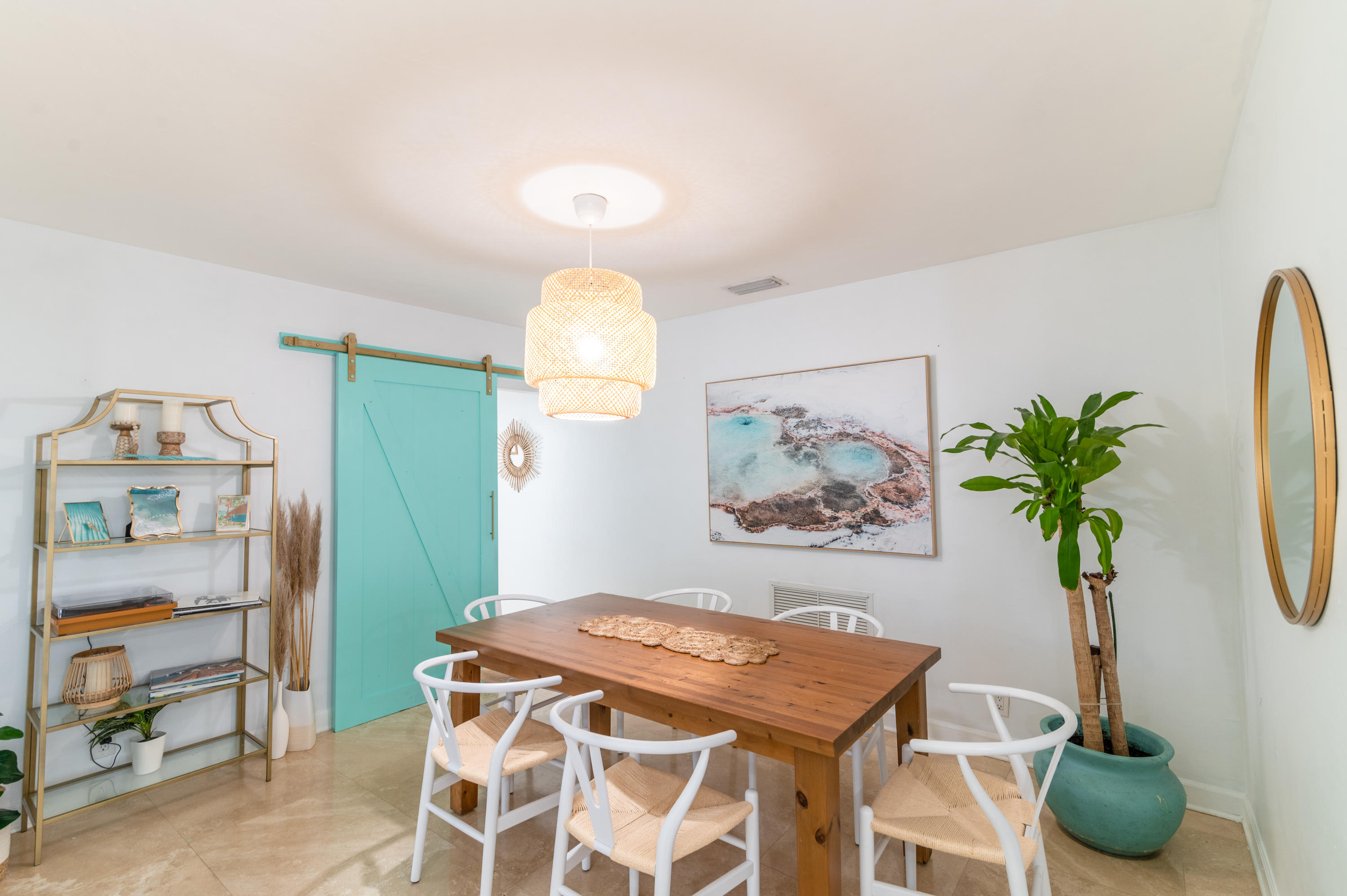 1502 Northwest 5th Street Boca Raton, FL 33486 - Photo 18 of 35 a view of a dining room with furniture and a potted plant