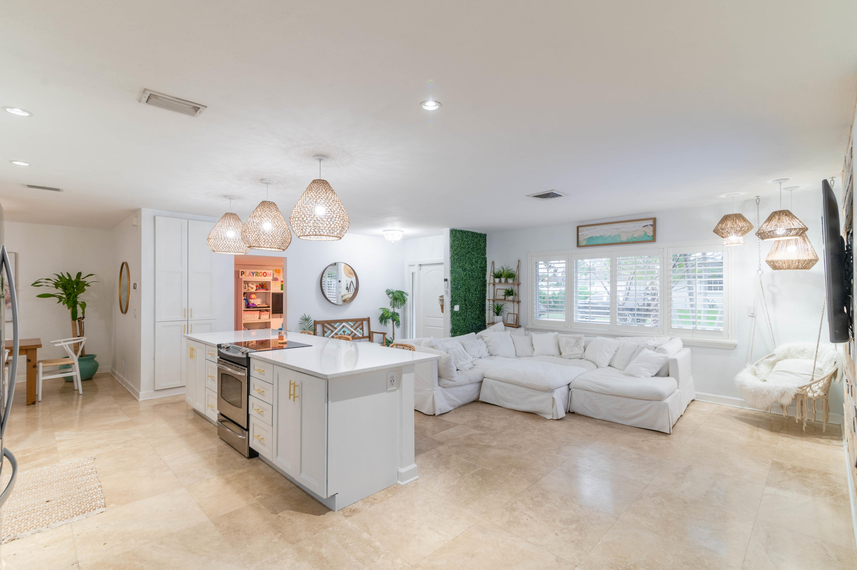 1502 Northwest 5th Street Boca Raton, FL 33486 - Photo 20 of 35 a living room with furniture and a large window