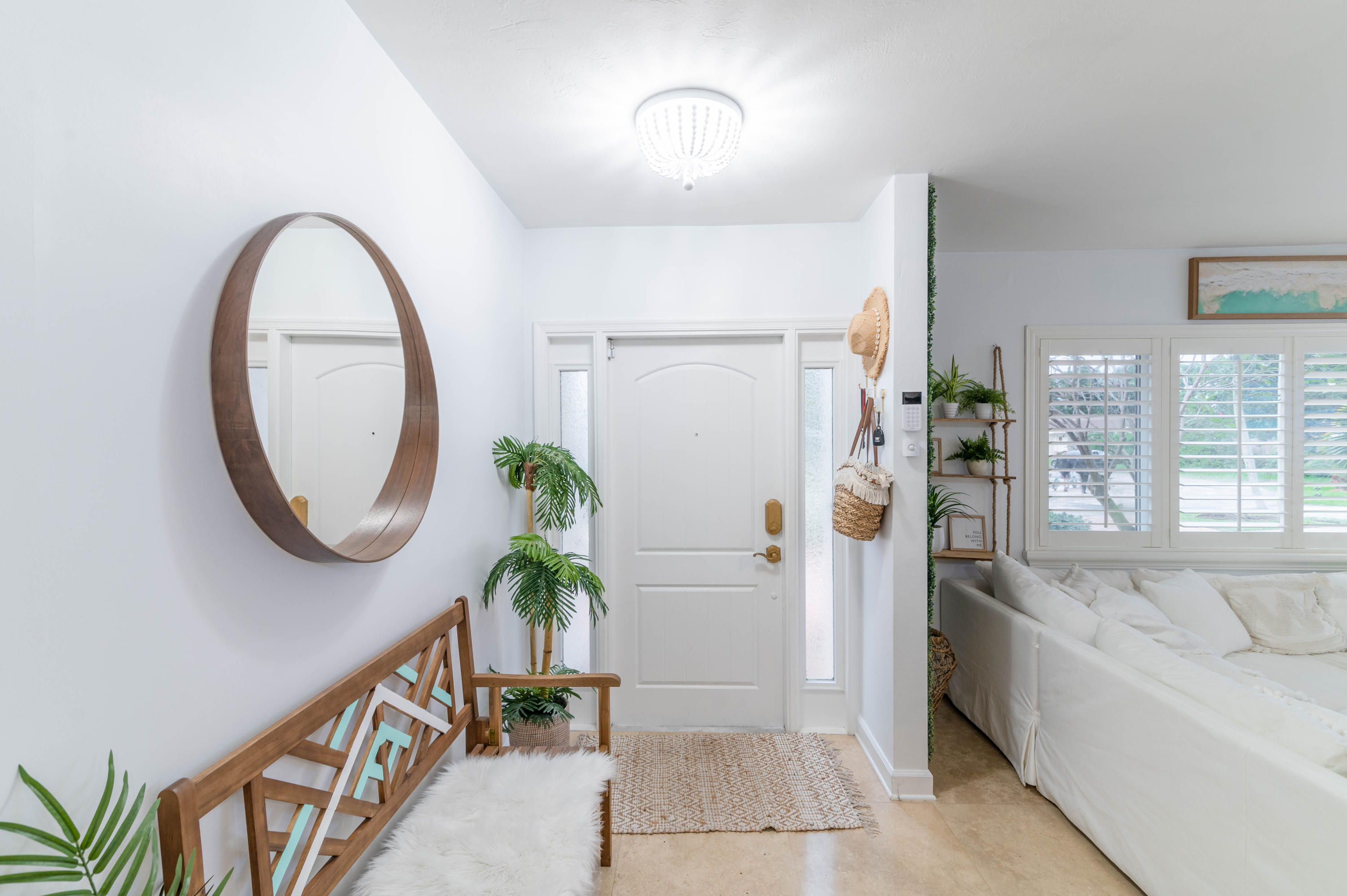 1502 Northwest 5th Street Boca Raton, FL 33486 - Photo 21 of 35 a view of an entryway with wooden floor and a livingroom