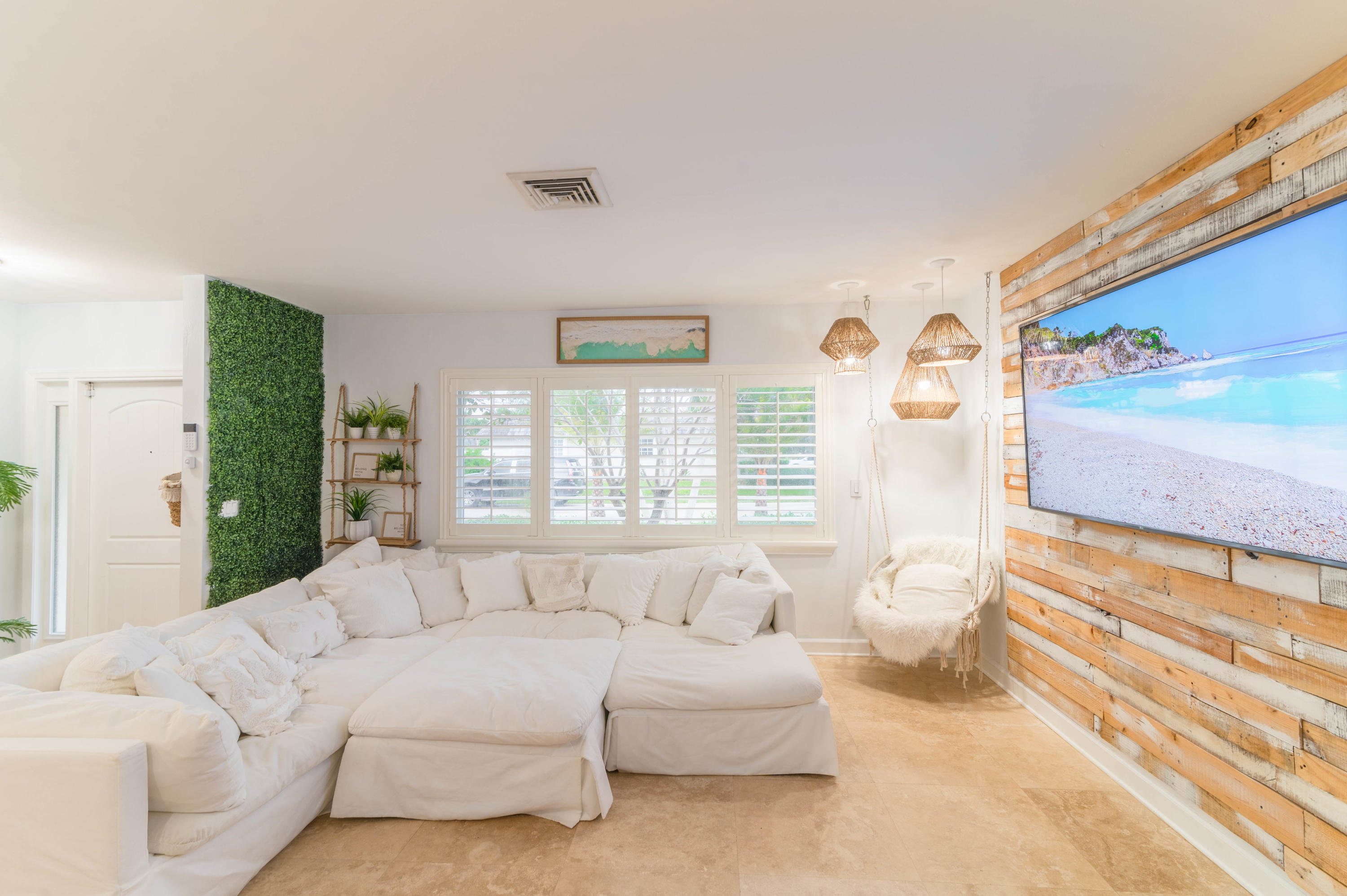 1502 Northwest 5th Street Boca Raton, FL 33486 - Photo 22 of 35 a living room with furniture and a large window
