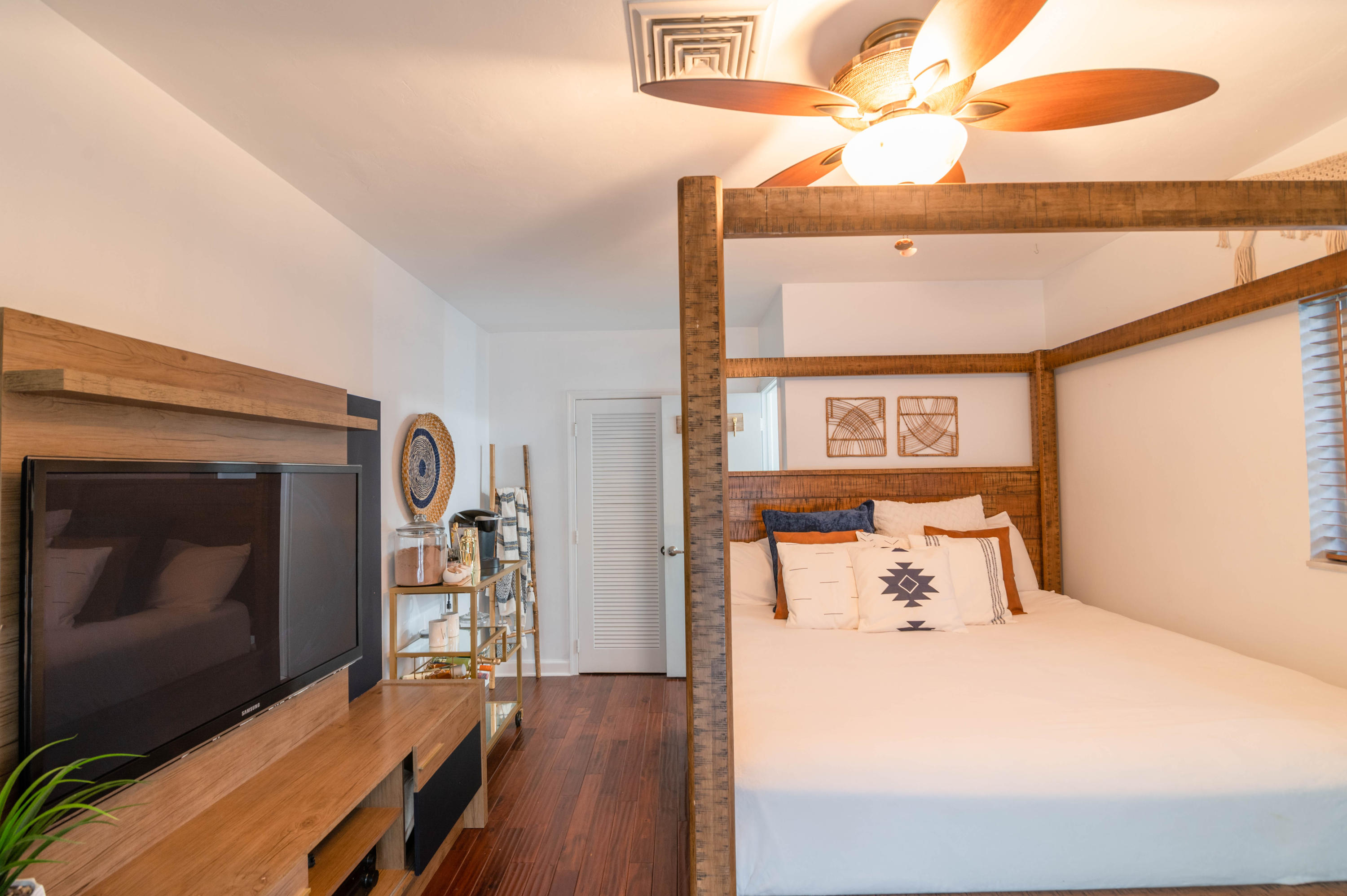 1502 Northwest 5th Street Boca Raton, FL 33486 - Photo 25 of 35 a bedroom with a bed and a ceiling fan