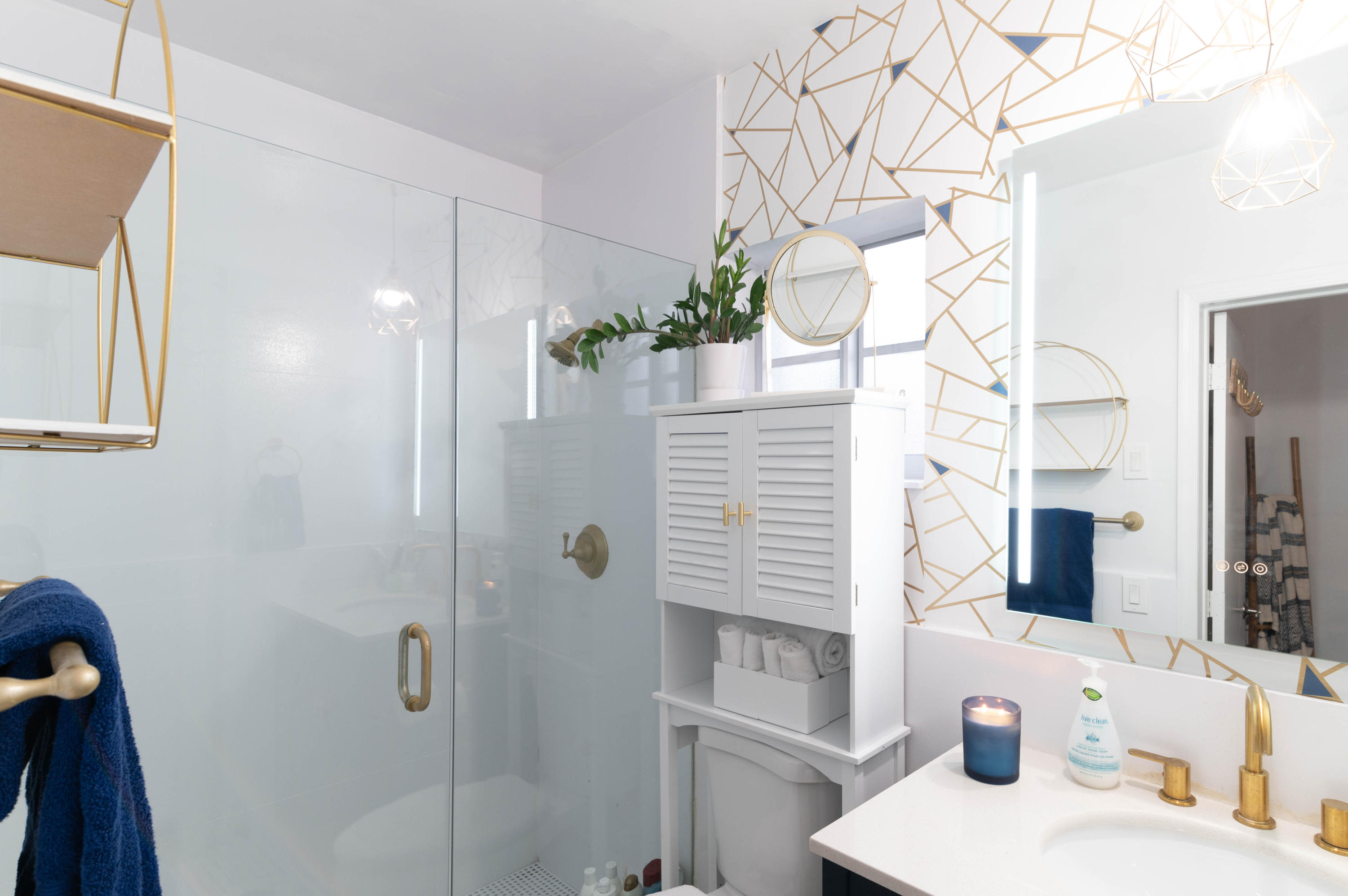 1502 Northwest 5th Street Boca Raton, FL 33486 - Photo 27 of 35 a bathroom with a sink and a mirror