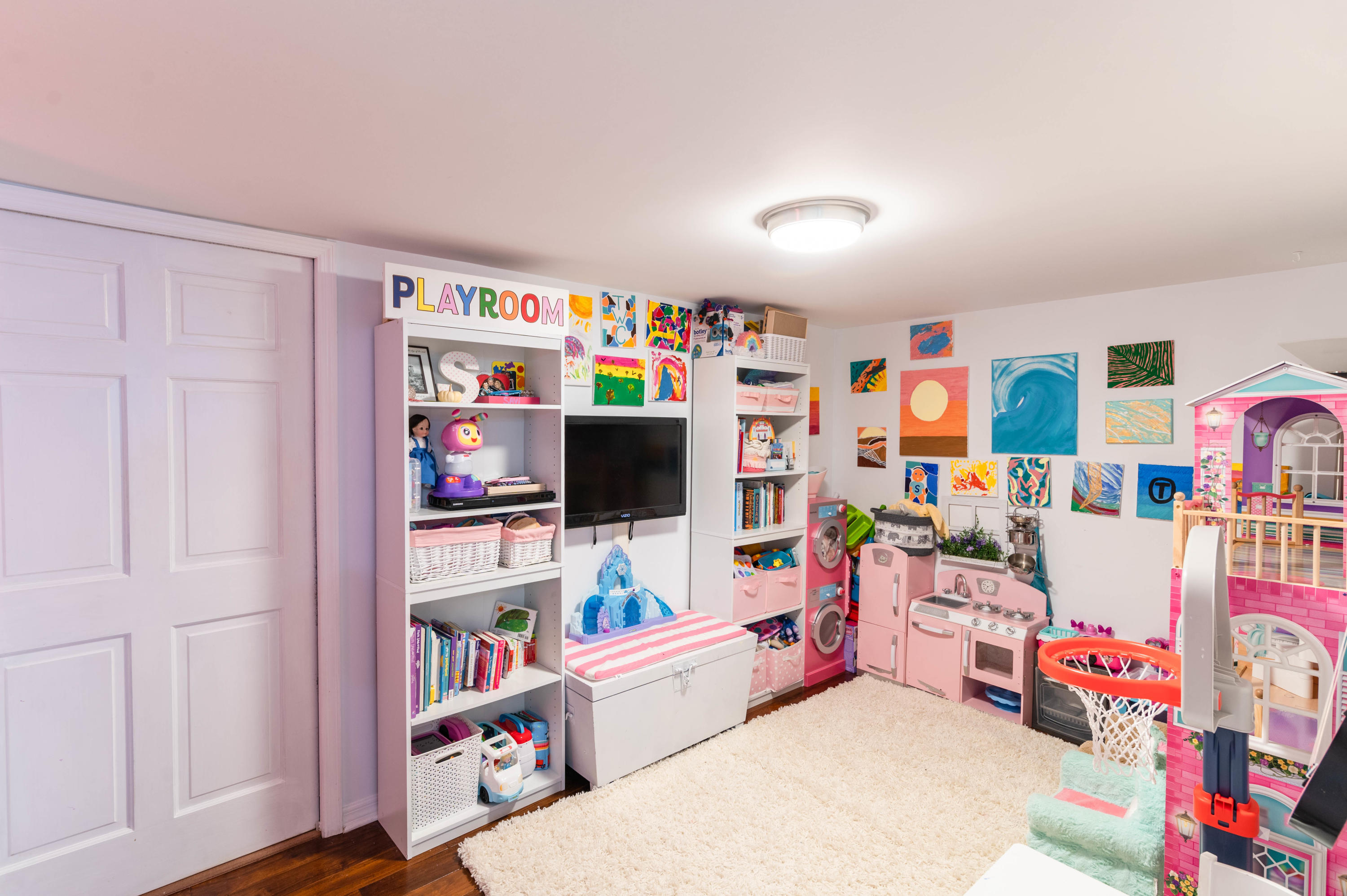 1502 Northwest 5th Street Boca Raton, FL 33486 - Photo 34 of 35 a room with toys and a flat screen tv