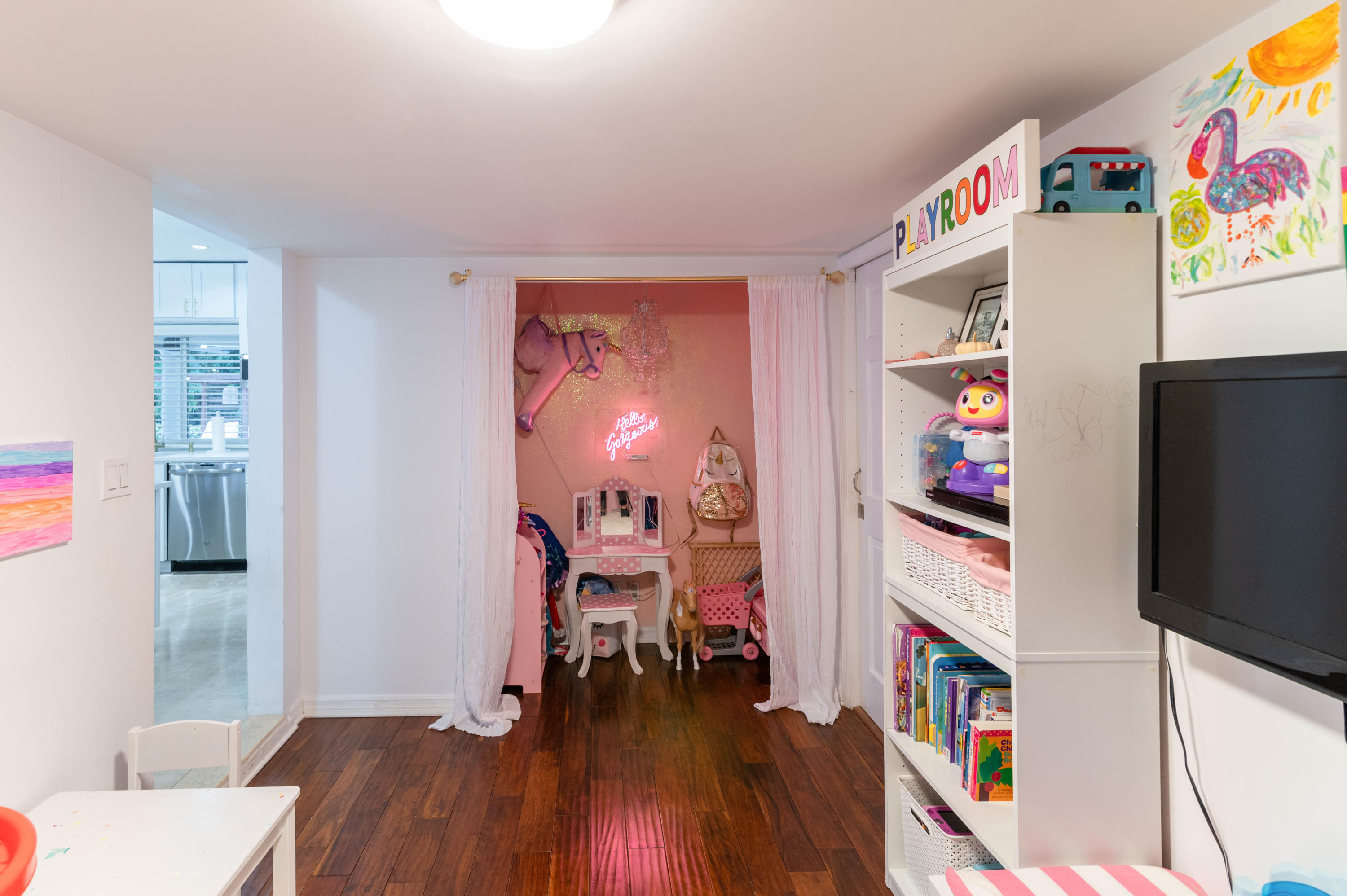 1502 Northwest 5th Street Boca Raton, FL 33486 - Photo 35 of 35 a living room with furniture and a flat screen tv