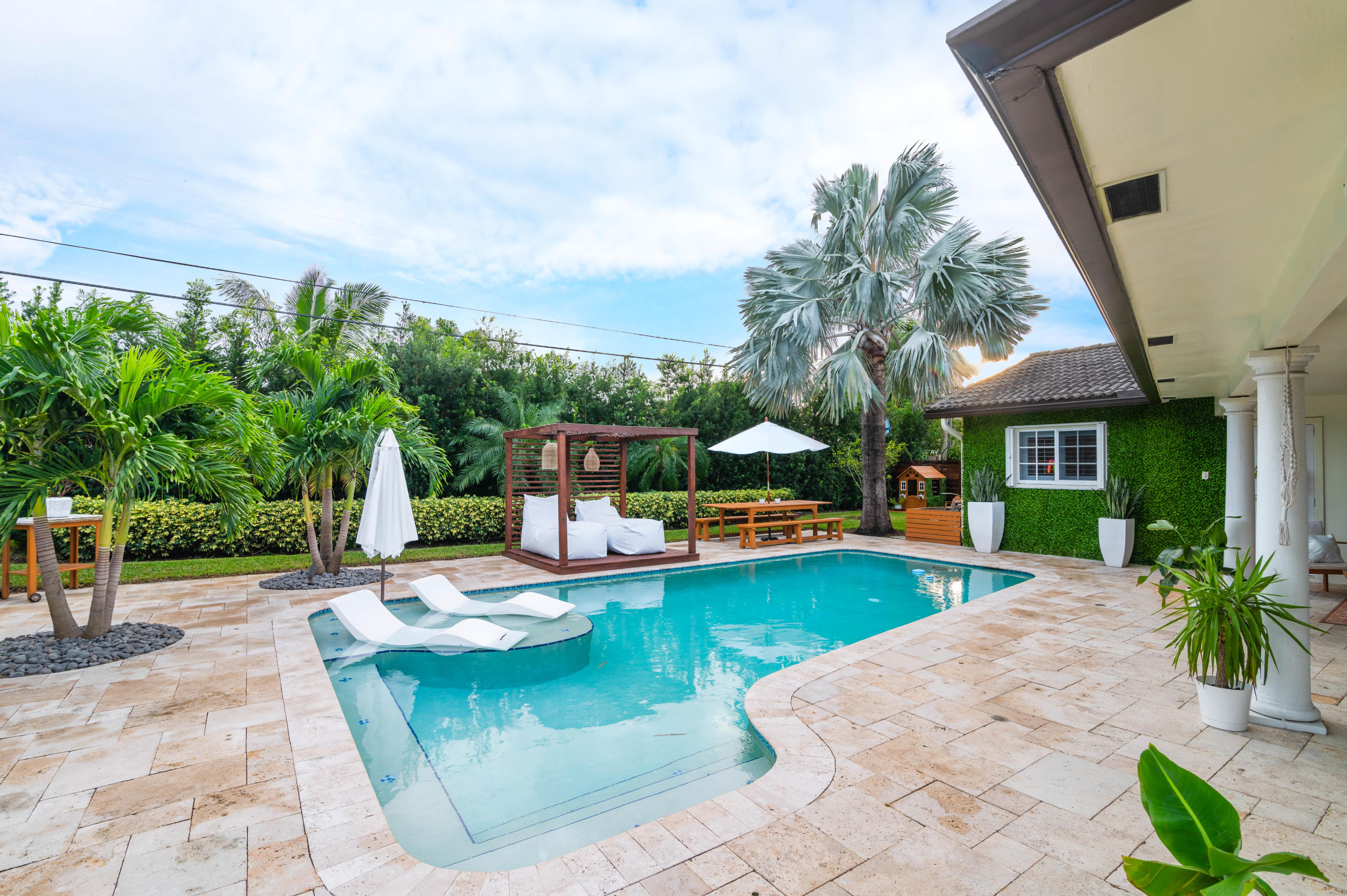 1502 Northwest 5th Street Boca Raton, FL 33486 - Photo 6 of 35 a view of a swimming pool with sitting area and slide