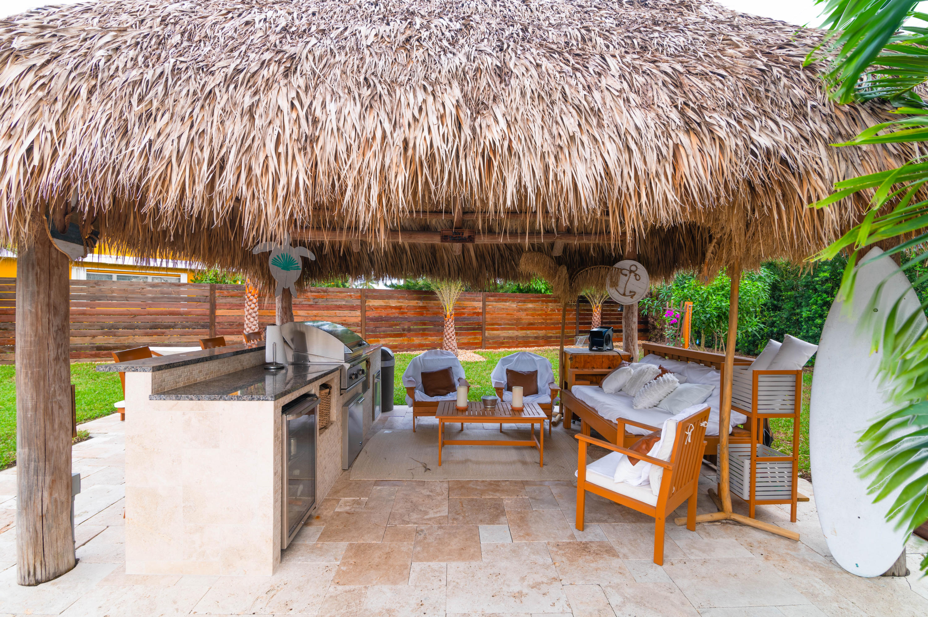 1502 Northwest 5th Street Boca Raton, FL 33486 - Photo 10 of 35 an outdoor sitting area with chairs and plants