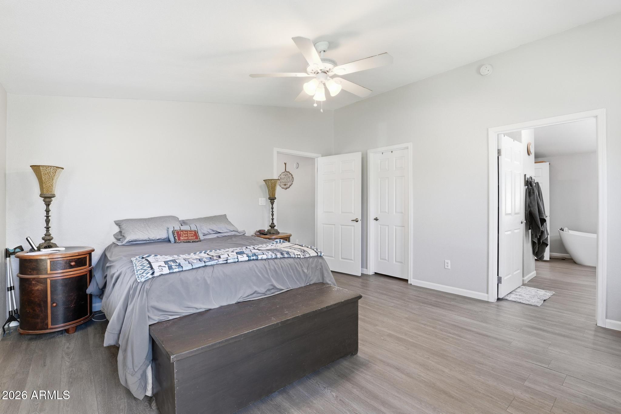 191 Cornerstone Way Payson, AZ 85541 - Photo 15 of 37 a bedroom with a bed and a ceiling fan