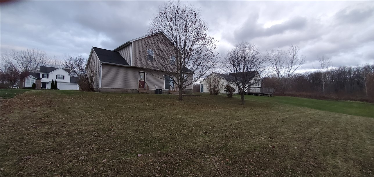 79 Eastview Commons Road Gates, NY 14624 - Photo 30 of 32 Spacious Back Yard