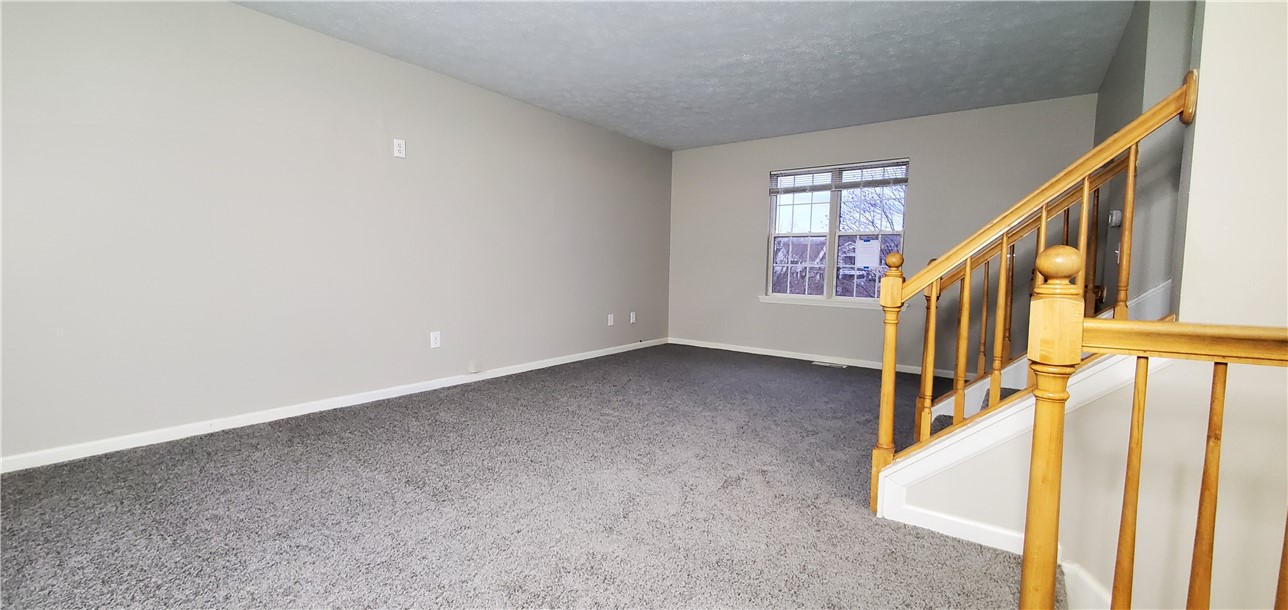 79 Eastview Commons Road Gates, NY 14624 - Photo 4 of 32 Living Room Facing Back of House