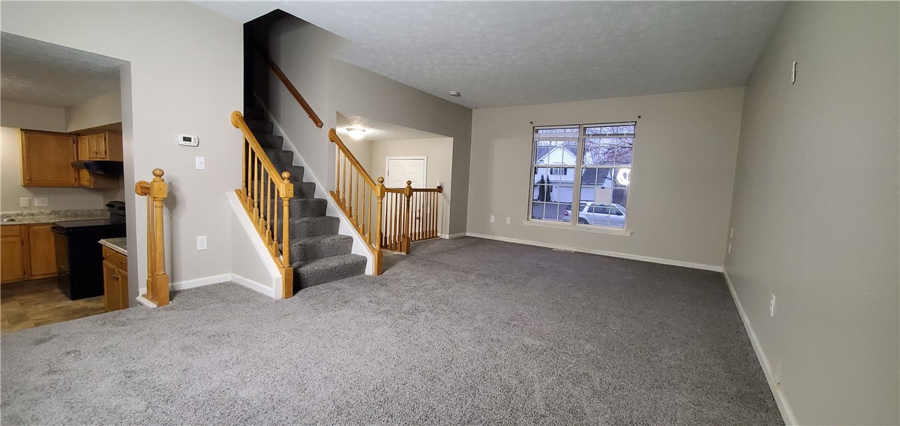 79 Eastview Commons Road Gates, NY 14624 - Photo 5 of 32 Living Room Facing Front of House