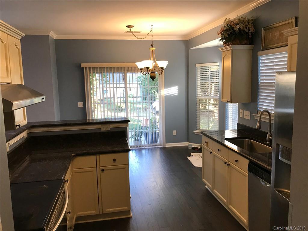 609 Eaton Court Fort Mill, SC 29708 - Photo 13 of 24 a kitchen with sink and window