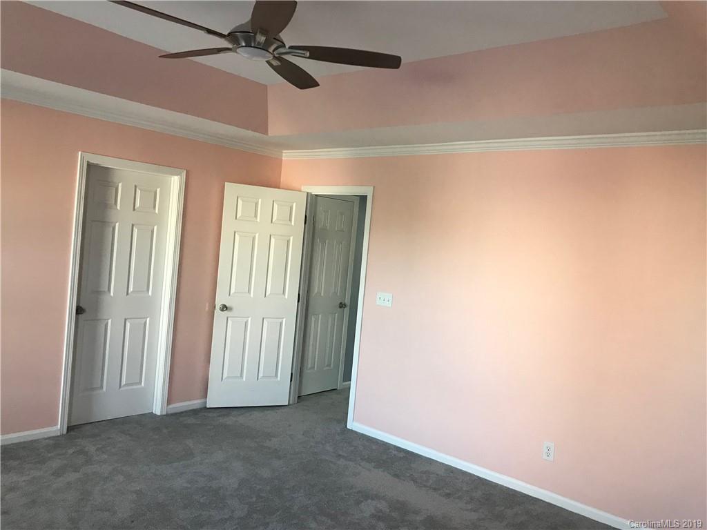 609 Eaton Court Fort Mill, SC 29708 - Photo 19 of 24 an empty room with windows