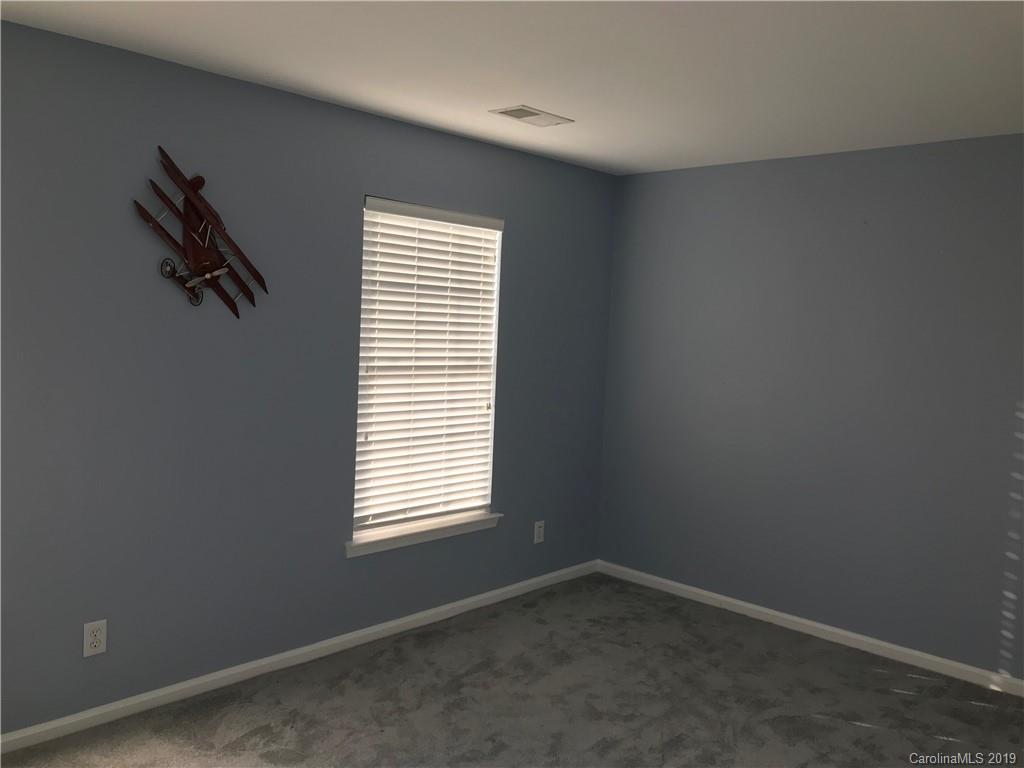 609 Eaton Court Fort Mill, SC 29708 - Photo 21 of 24 an empty room with windows