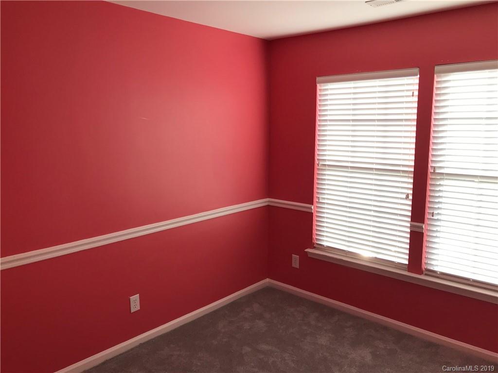 609 Eaton Court Fort Mill, SC 29708 - Photo 22 of 24 a view of an empty room with a window