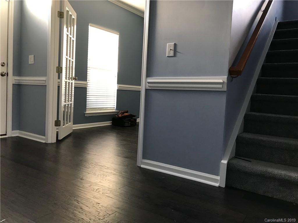 609 Eaton Court Fort Mill, SC 29708 - Photo 6 of 24 wooden floor in an empty room with a window