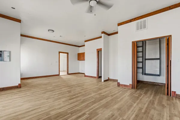 a view of a bathroom from a hallway