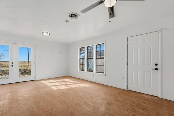 a view of a hallway with a workspace