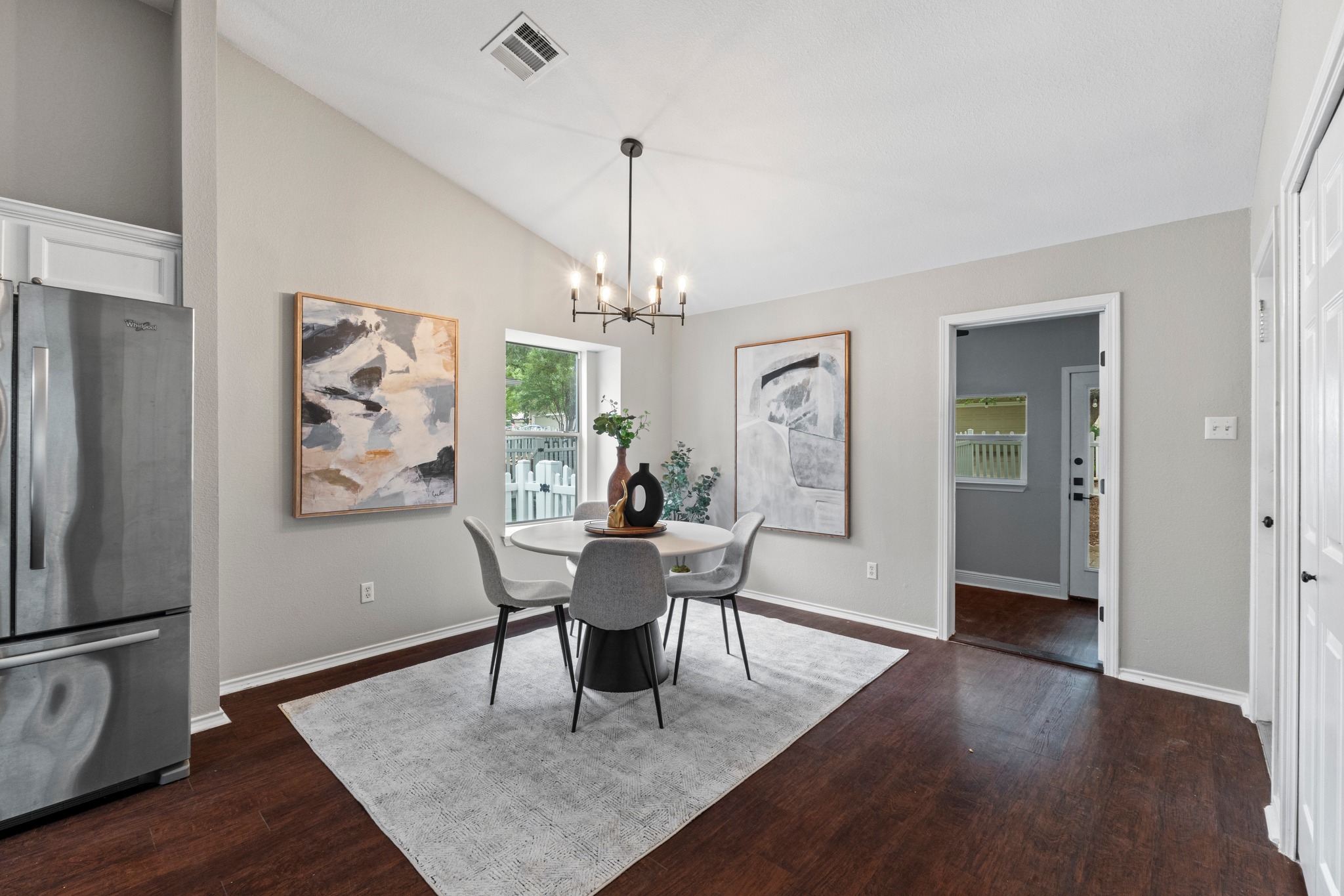 1042 Monadale Trail Round Rock, TX 78664 - Photo 20 of 40 a view of a dining room with furniture window and wooden floor
