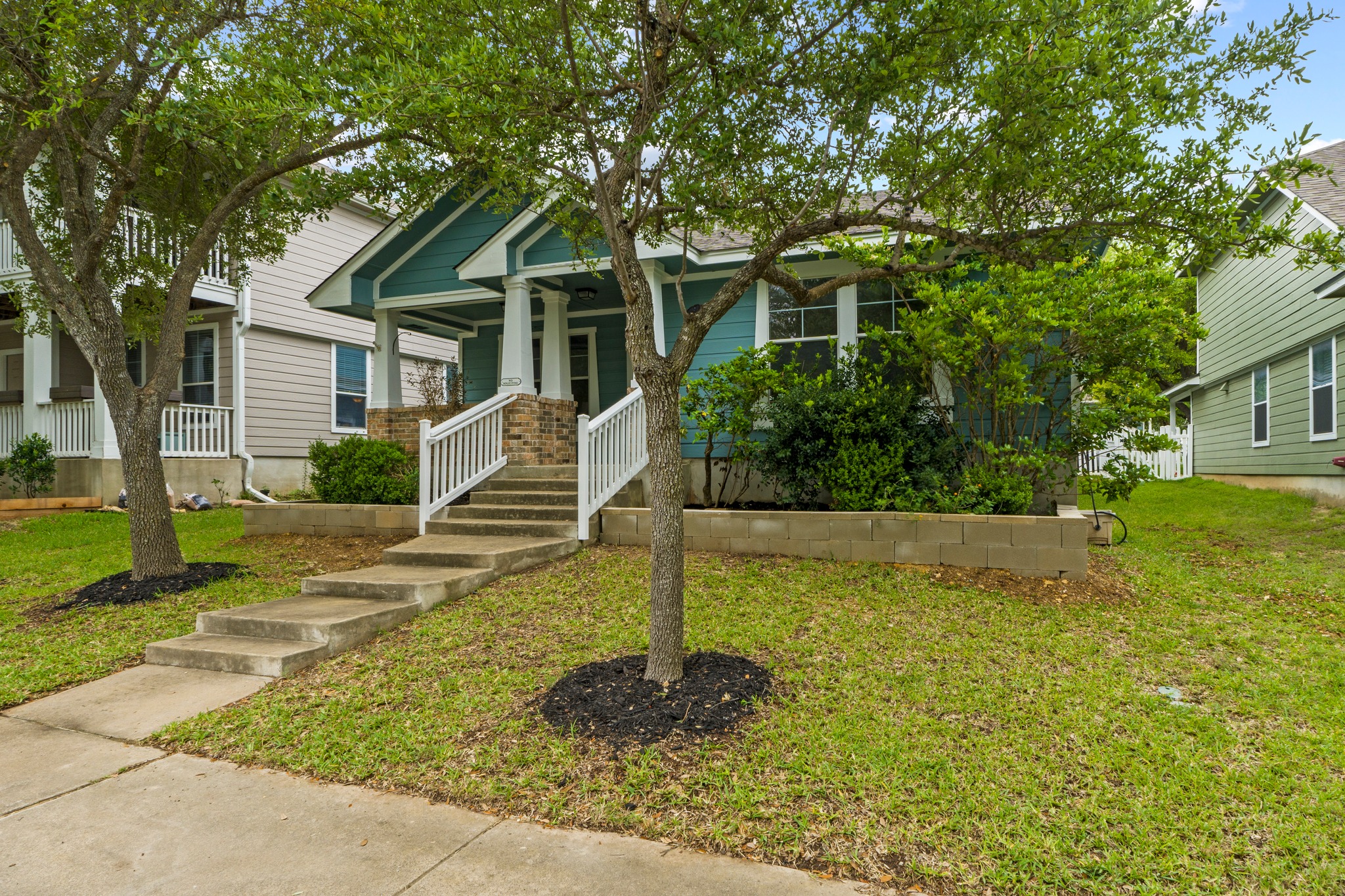 1042 Monadale Trail Round Rock, TX 78664 - Photo 2 of 40 a front view of a house with a yard