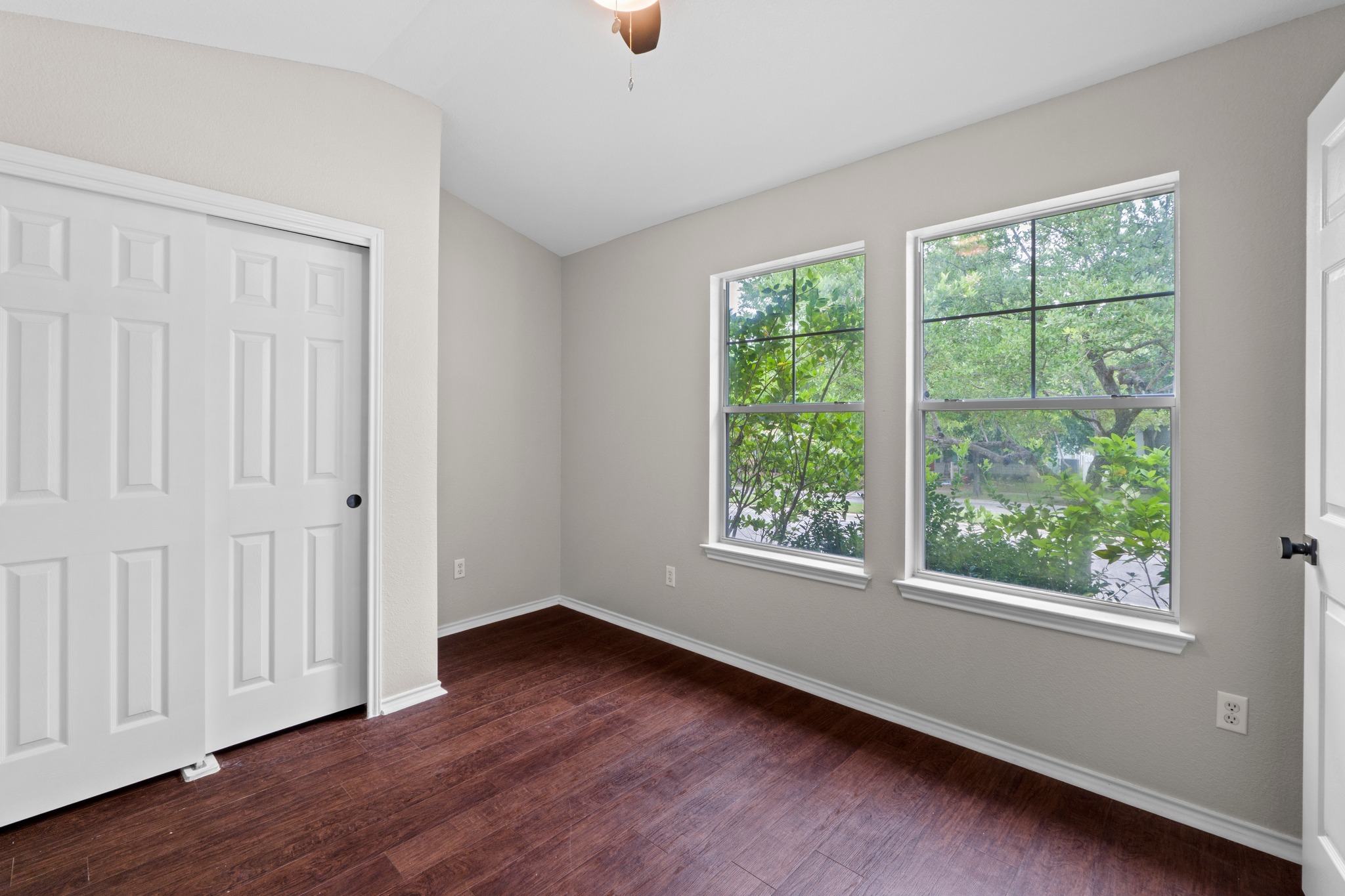 1042 Monadale Trail Round Rock, TX 78664 - Photo 26 of 40 a view of a livingroom with wooden floor and window