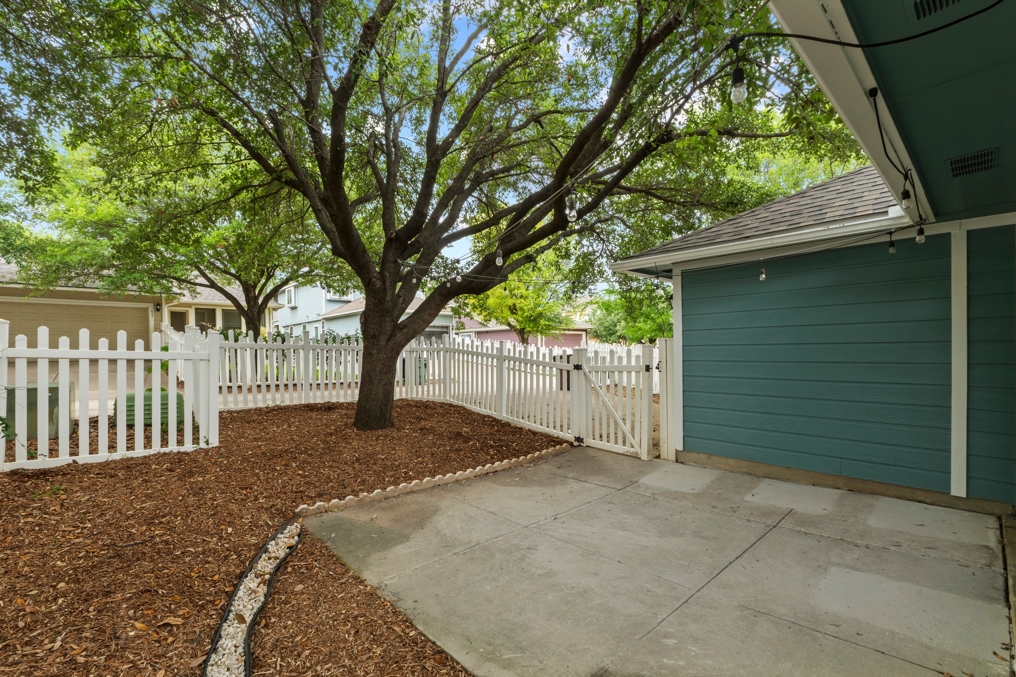1042 Monadale Trail Round Rock, TX 78664 - Photo 30 of 40 a house with trees in front of it