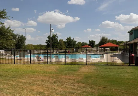a view of swimming pool with outdoor seating
