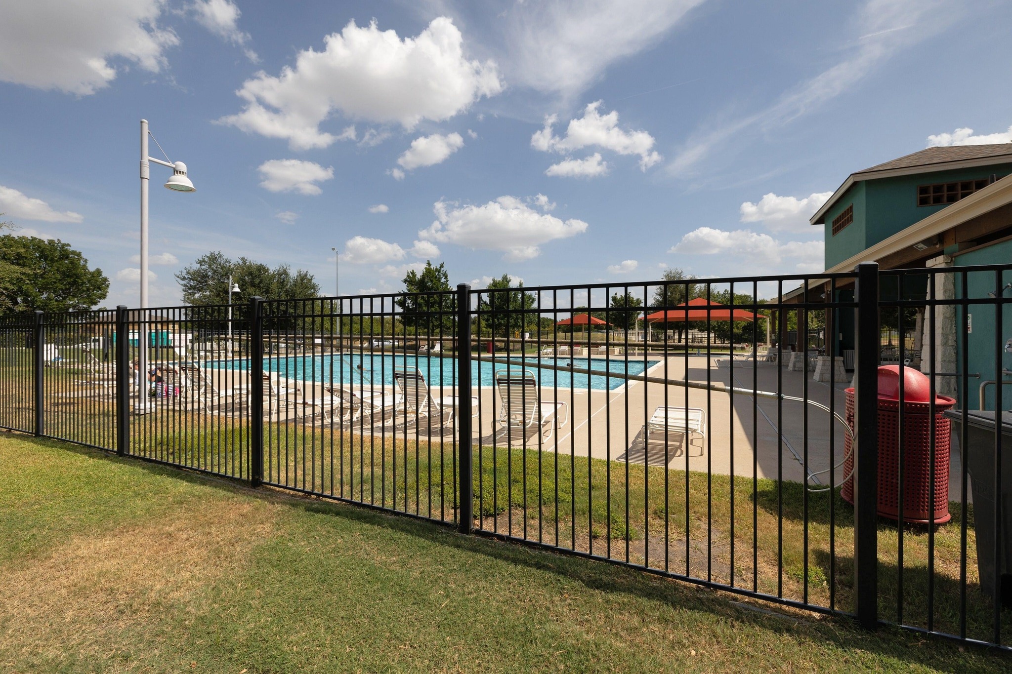 1042 Monadale Trail Round Rock, TX 78664 - Photo 34 of 40 a view of a wrought iron fences in front of house