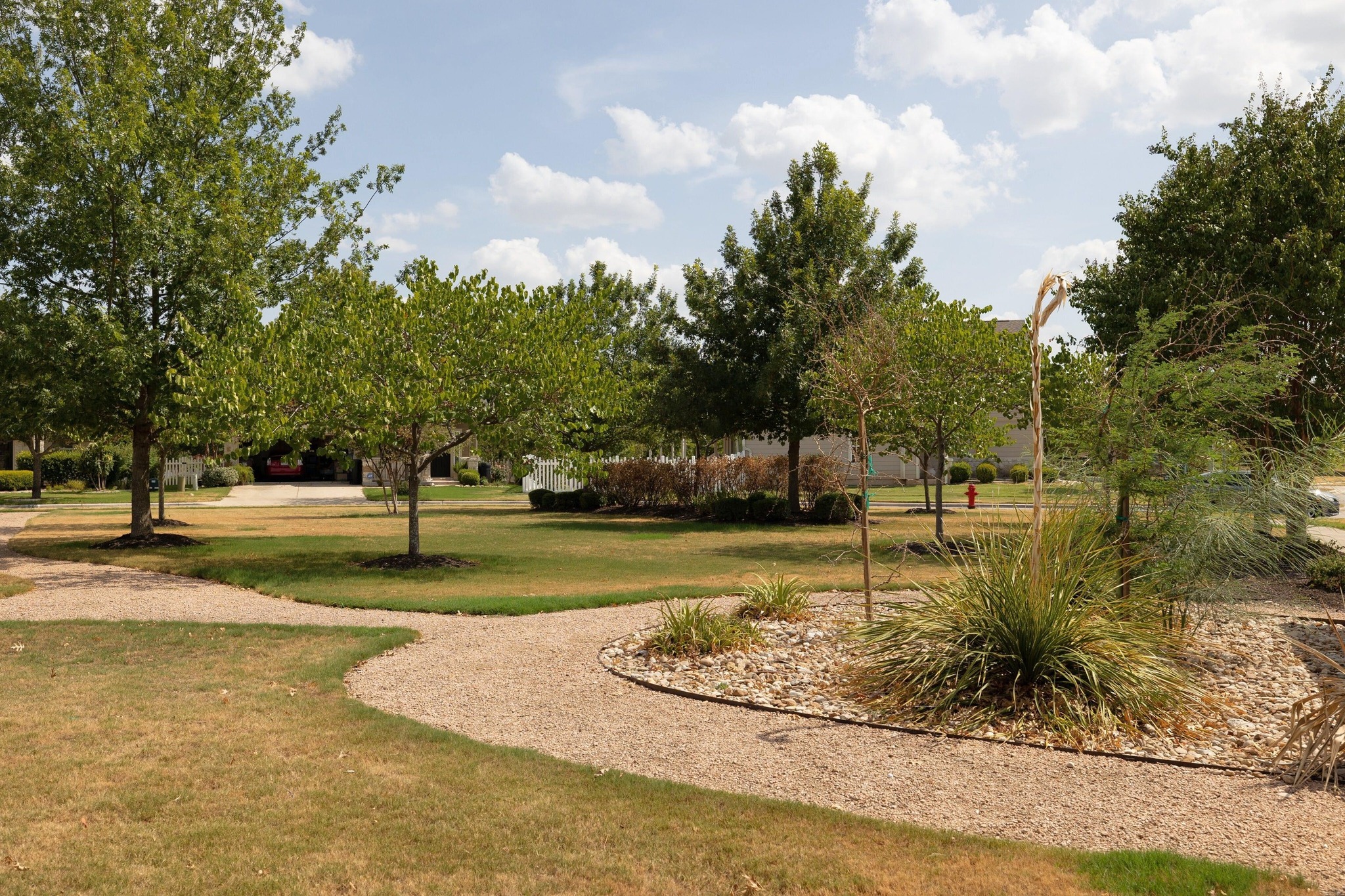 1042 Monadale Trail Round Rock, TX 78664 - Photo 38 of 40 a view of a fountain in the middle of a yard