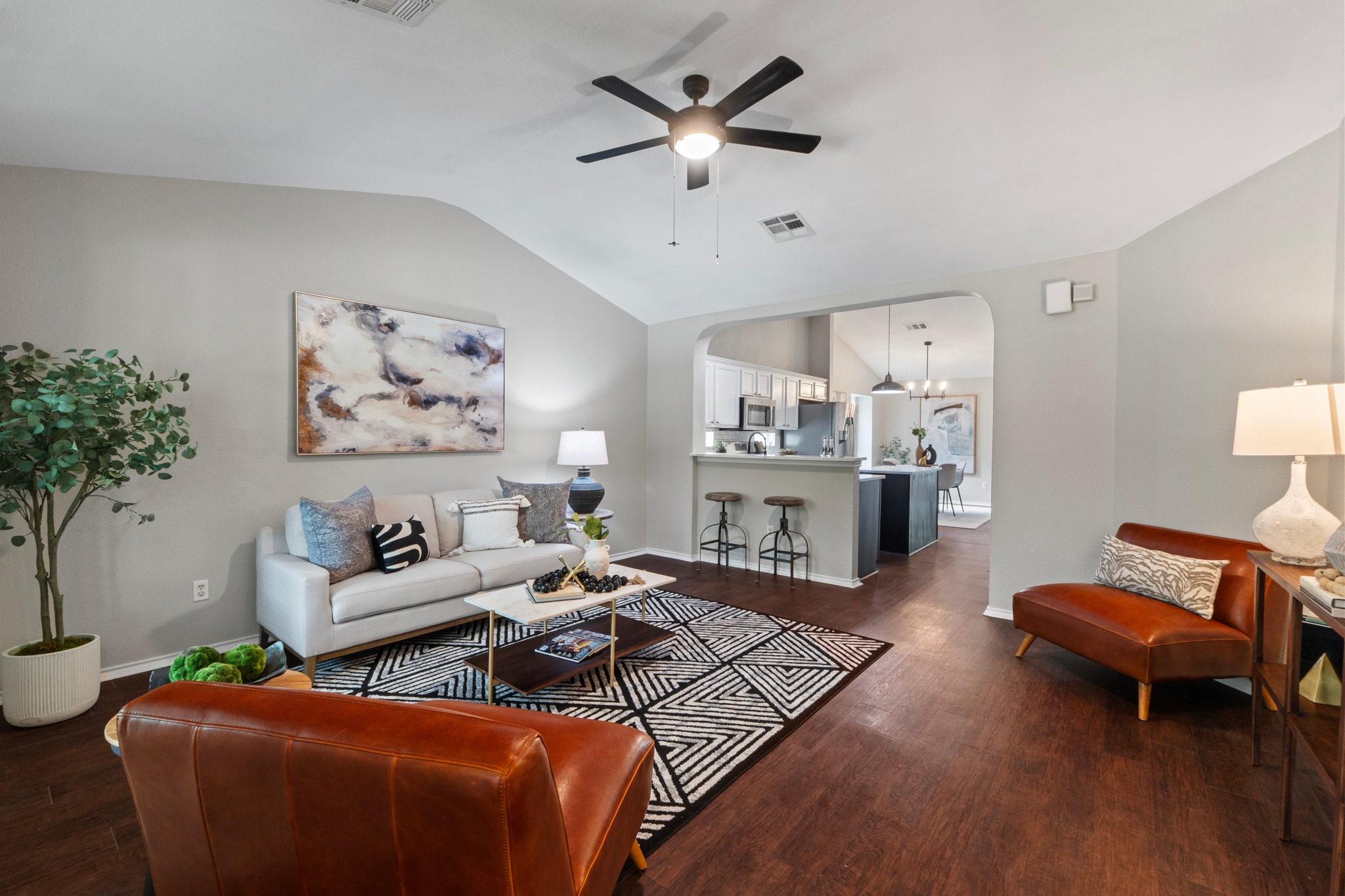 1042 Monadale Trail Round Rock, TX 78664 - Photo 5 of 40 a living room with furniture and wooden floor
