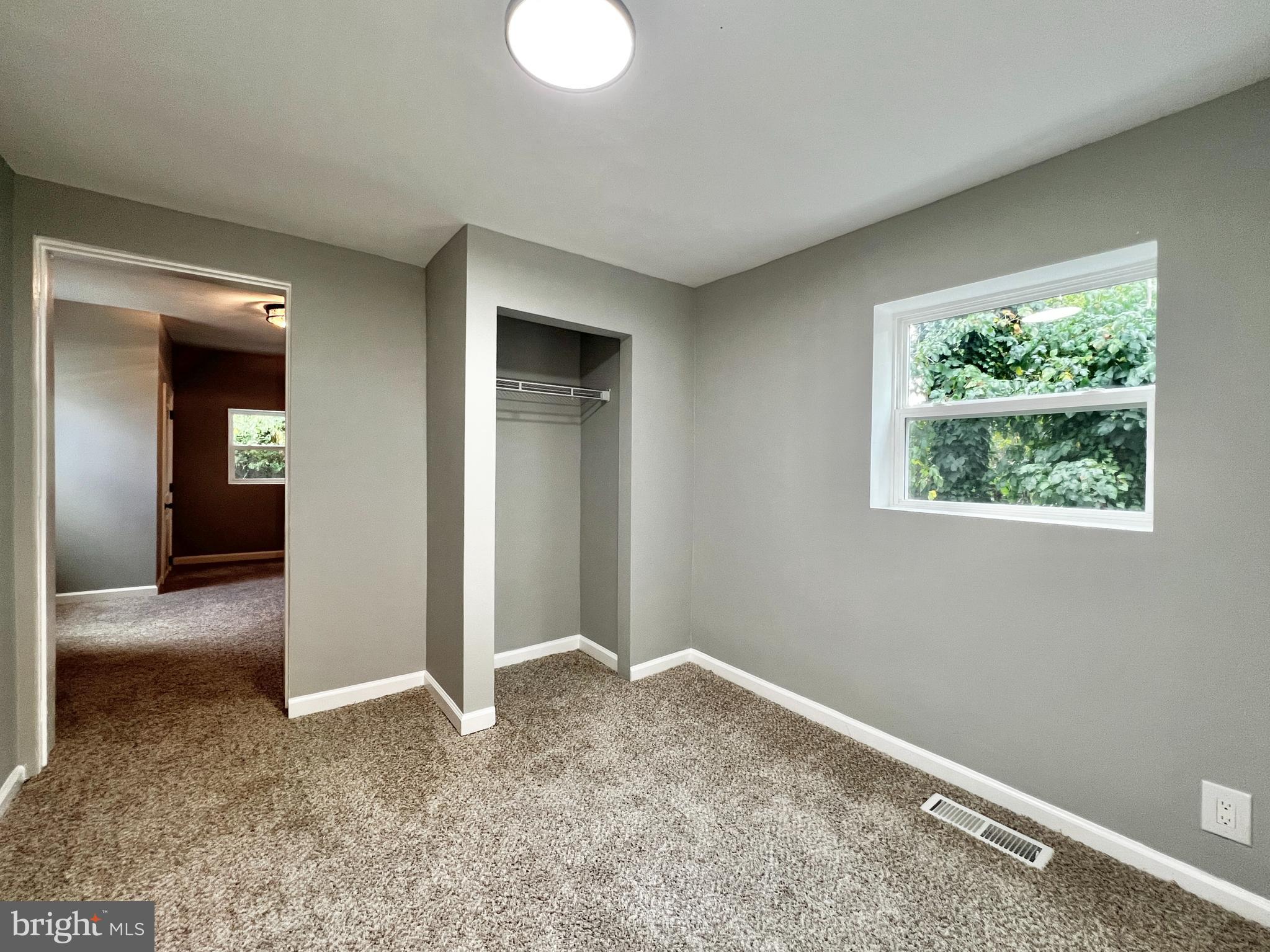 516 10th Avenue Lindenwold, NJ 08021 - Photo 12 of 22 an empty room with a window