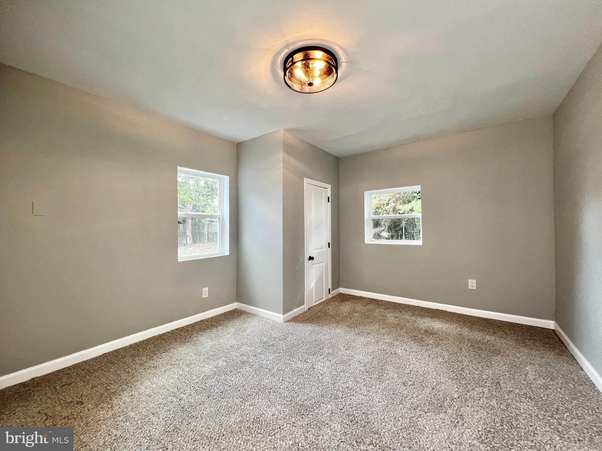 516 10th Avenue Lindenwold, NJ 08021 - Photo 13 of 22 a view of an empty room with a window