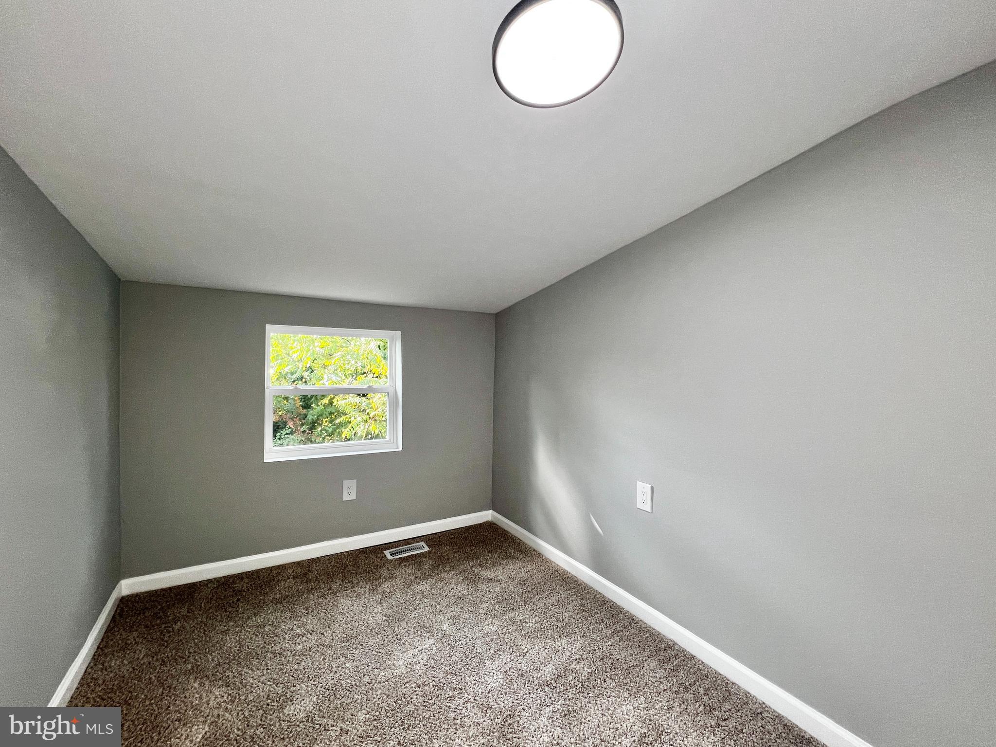516 10th Avenue Lindenwold, NJ 08021 - Photo 15 of 22 an empty room with windows