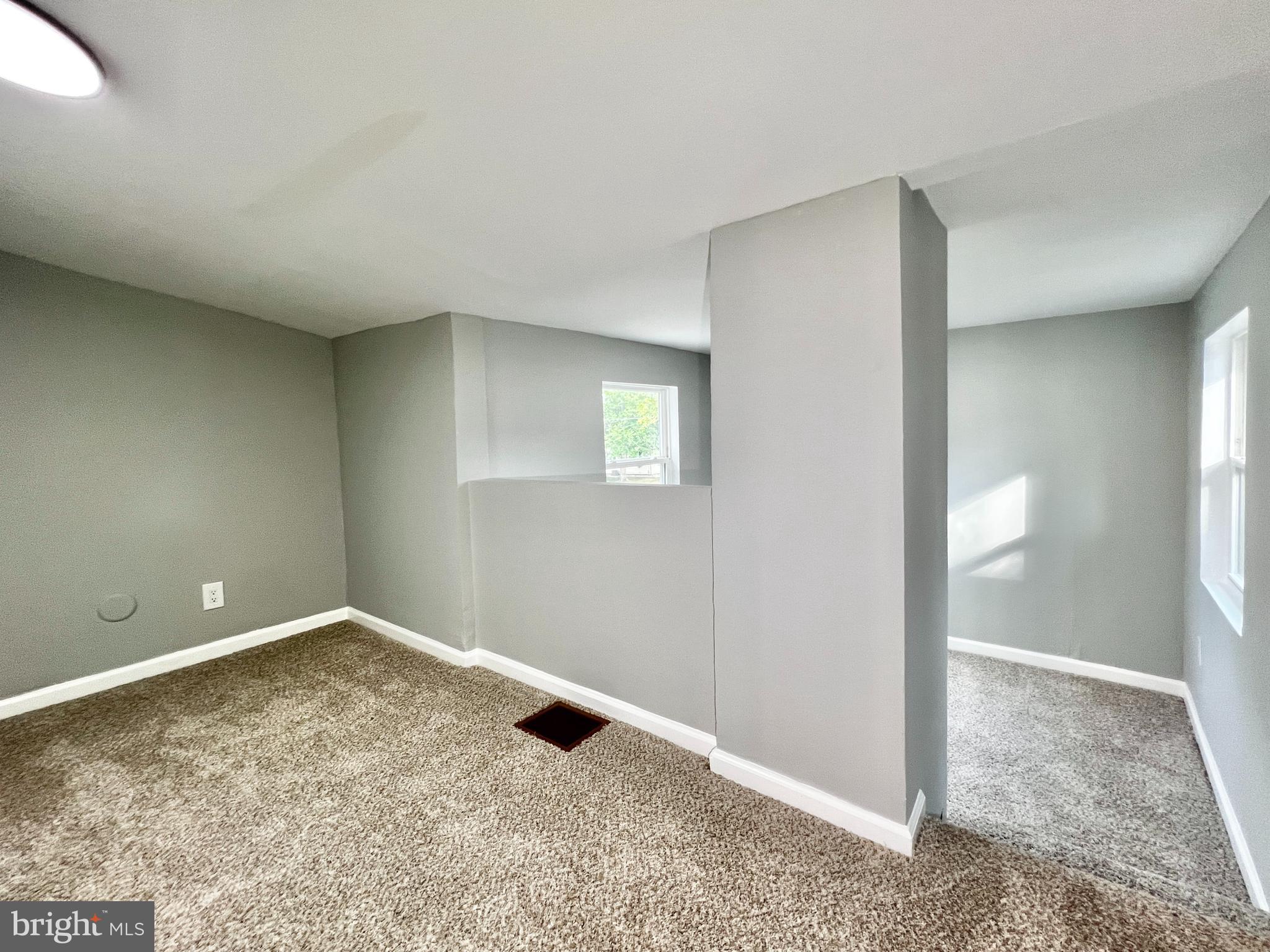 516 10th Avenue Lindenwold, NJ 08021 - Photo 18 of 22 an empty room with windows