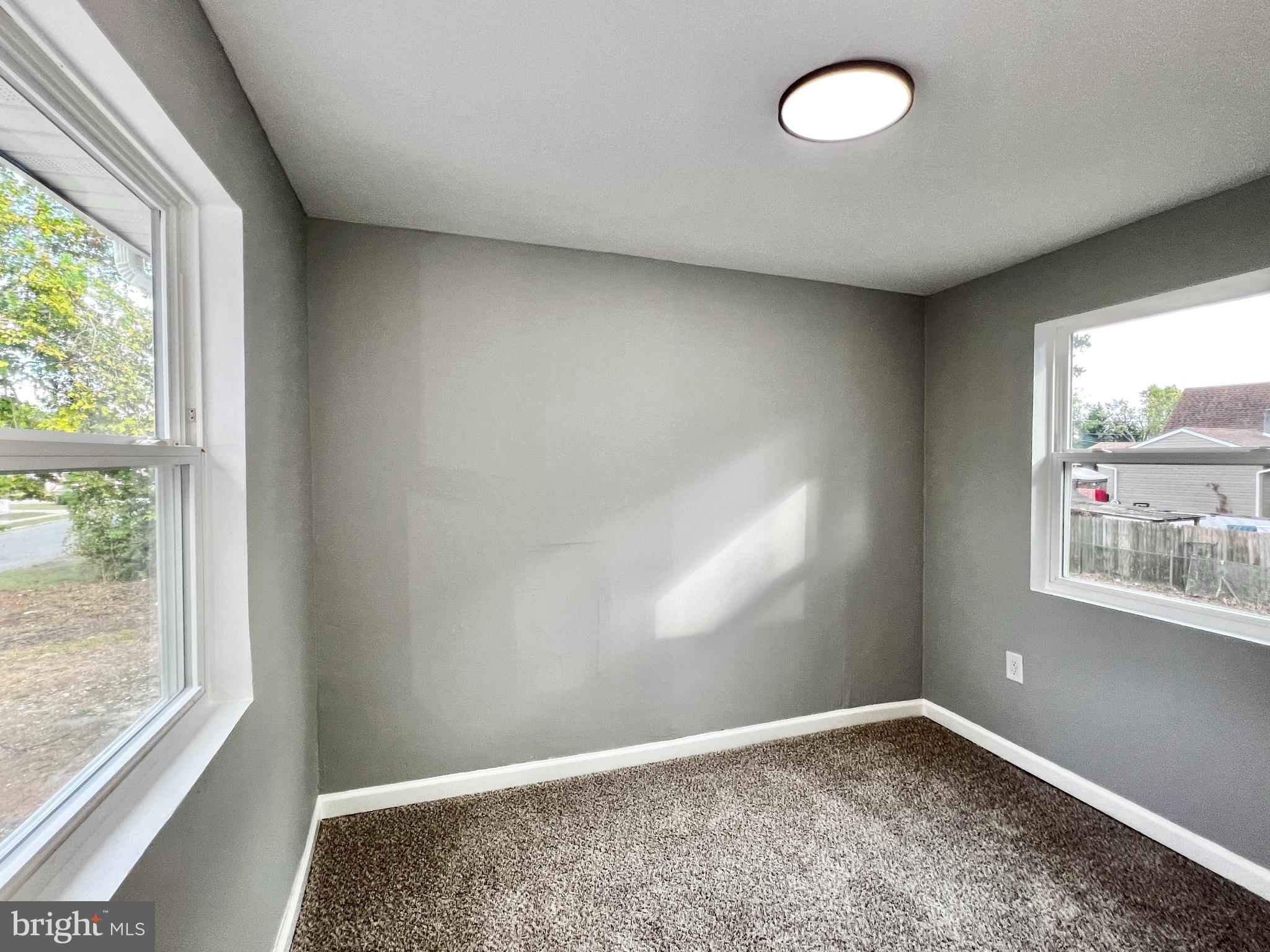 516 10th Avenue Lindenwold, NJ 08021 - Photo 20 of 22 an empty room with a window
