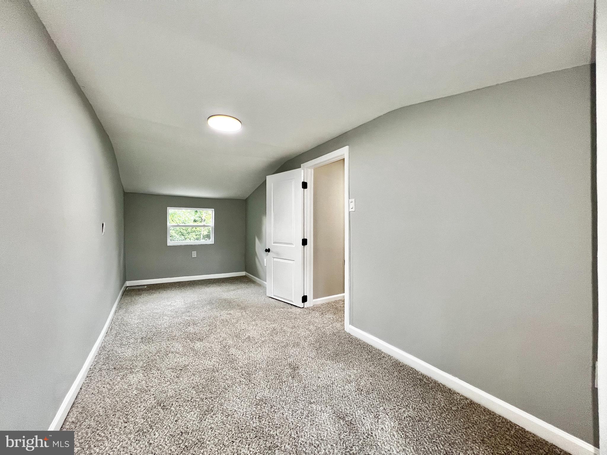 516 10th Avenue Lindenwold, NJ 08021 - Photo 22 of 22 an empty room with windows and closet