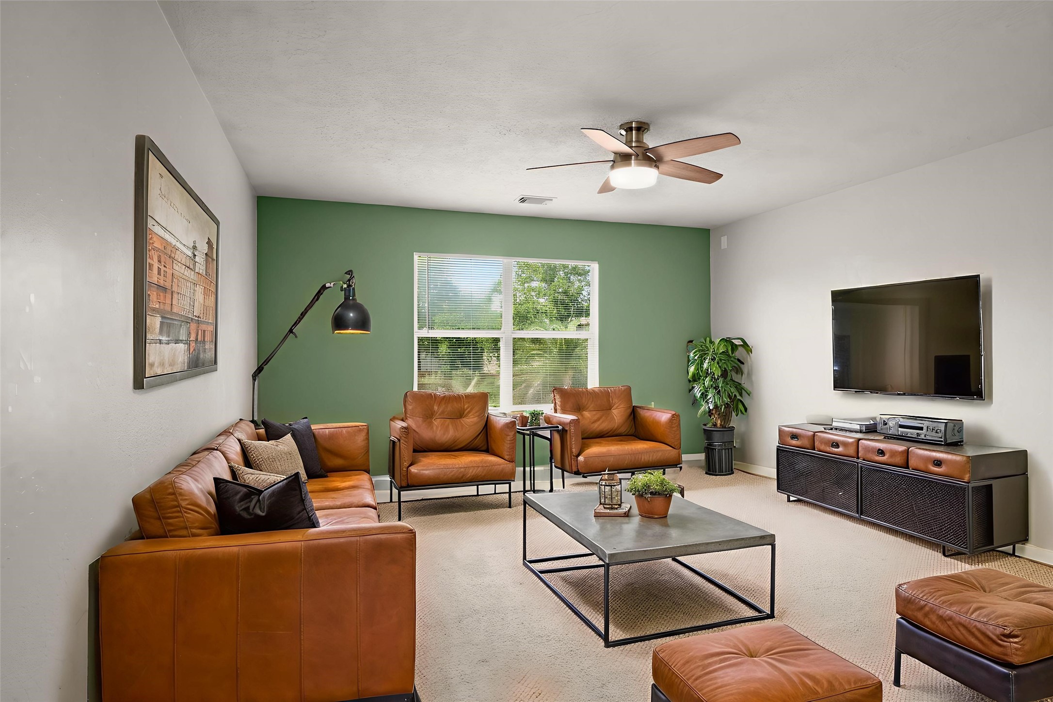 19819 Rippling Brook Lane Tomball, TX 77375 - Photo 21 of 28 Game room - Neutral carpet and paint, ceiling fan and custom accent wall.