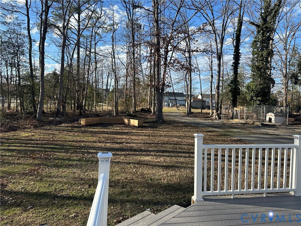 10510 Courtney Road Glen Allen, VA 23060 - Photo 17 of 32 a view of a yard with large trees